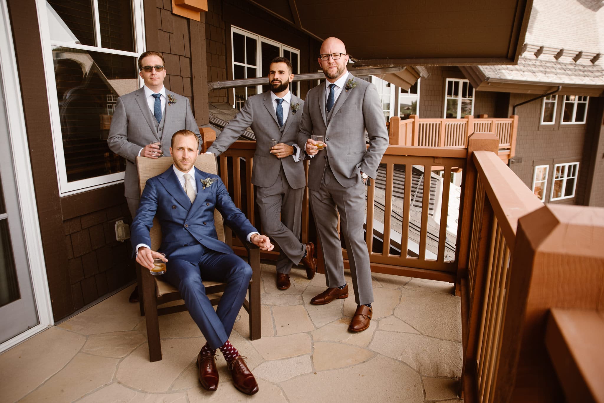 Groom with groomsmen at One Ski Hill Hotel before Breckenridge Nordic Center wedding