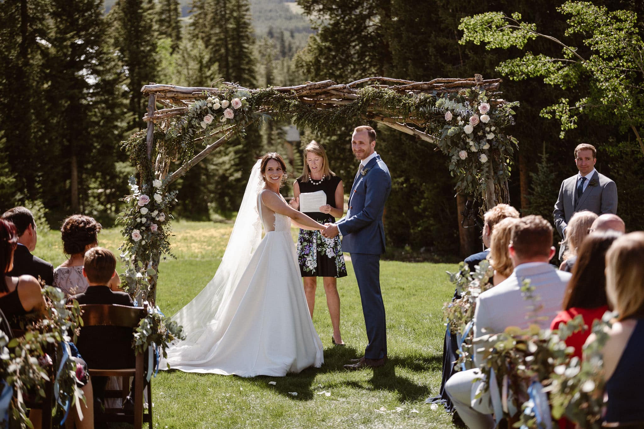 Breckenridge Nordic Center wedding venue, outdoor log cabin wedding ceremony, Colorado wedding photographer