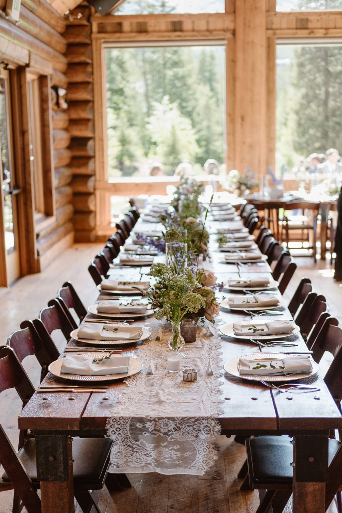 Breckenridge Nordic Center reception details with flowers by Flora by Nora, stationery by Cheree Berry Paper, Summit County wedding photographer, Colorado wedding