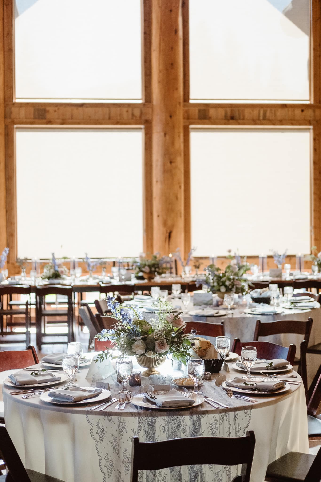 Breckenridge Nordic Center reception details with flowers by Flora by Nora, stationery by Cheree Berry Paper, Summit County wedding photographer, Colorado wedding