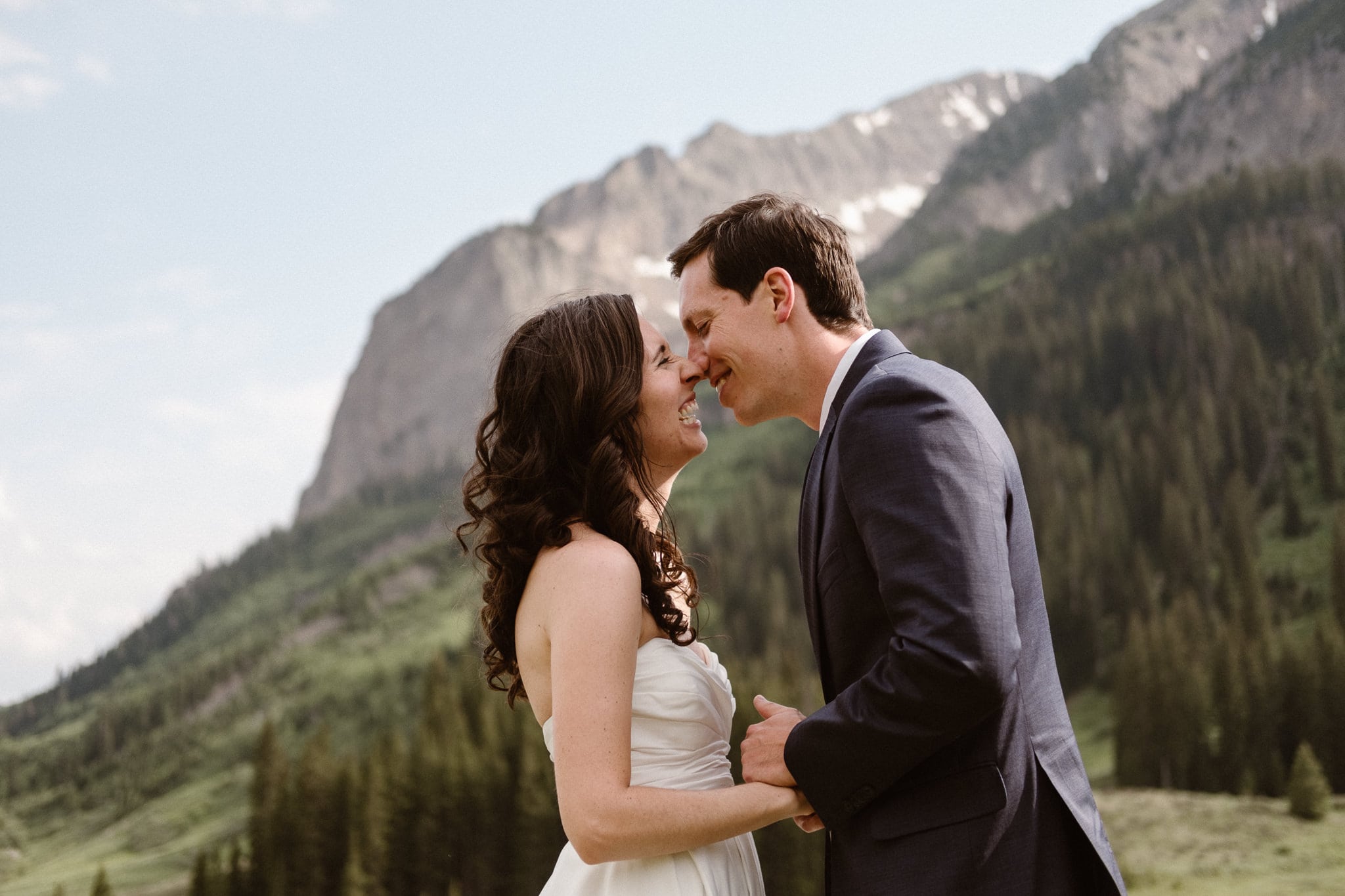 Crested Butte elopement photographer, Colorado adventure wedding photographer, bride and groom mountain portraits
