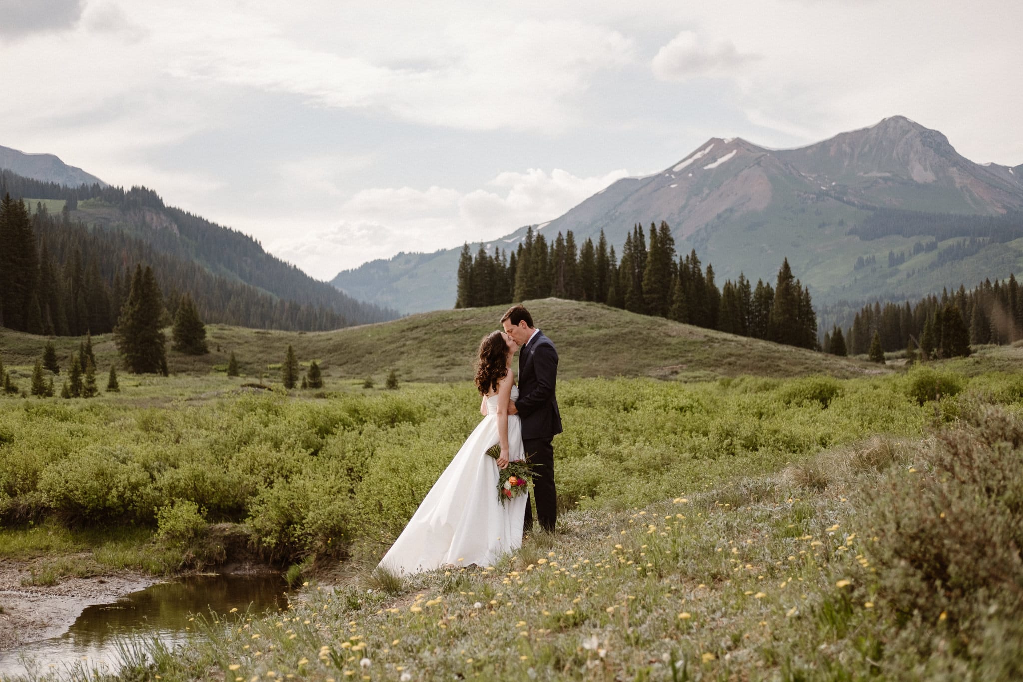 Crested Butte elopement photographer, Colorado adventure wedding photographer, bride and groom mountain portraits