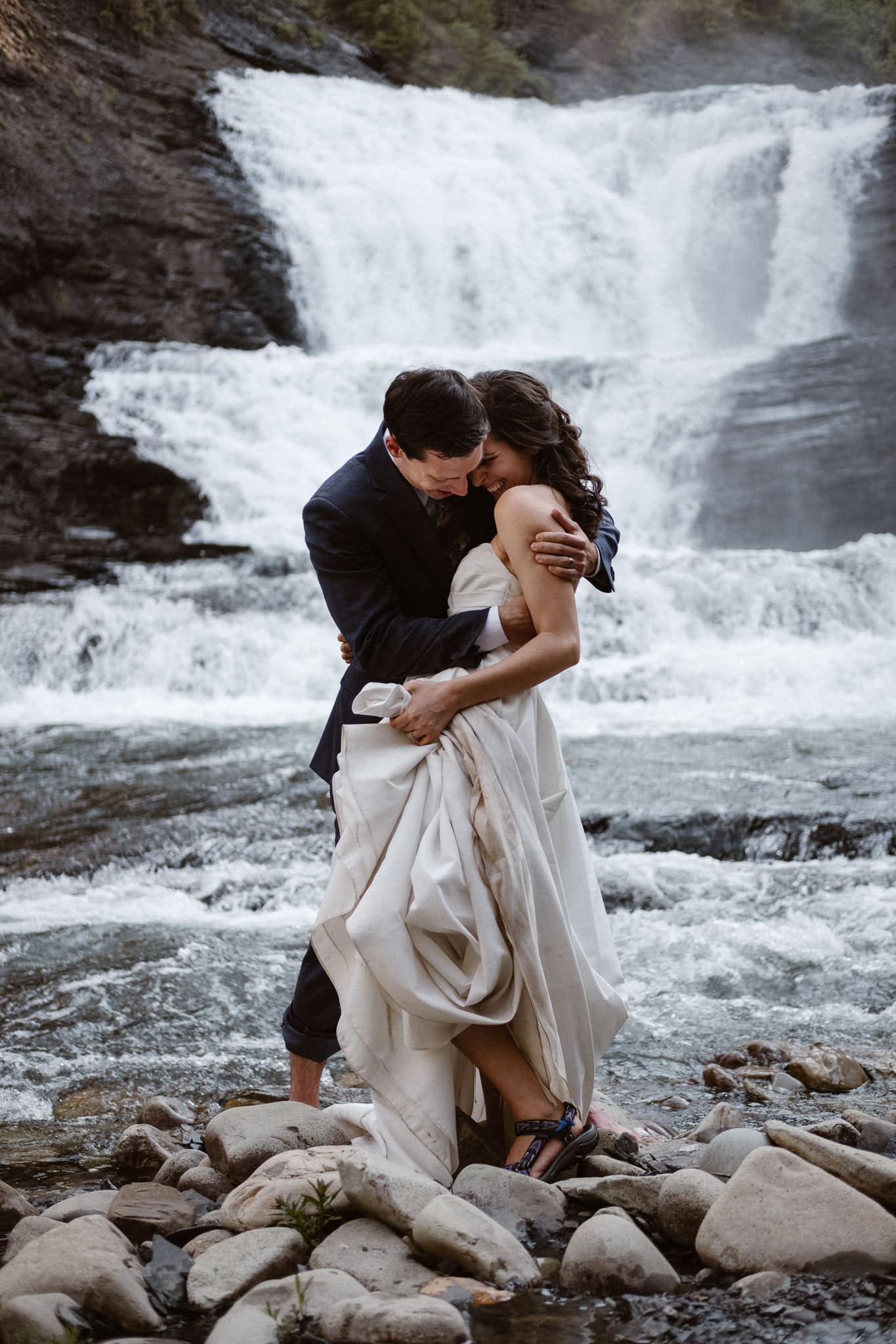 Crested Butte elopement photographer, Colorado adventure wedding photographer, bride and groom portraits at secret waterfall