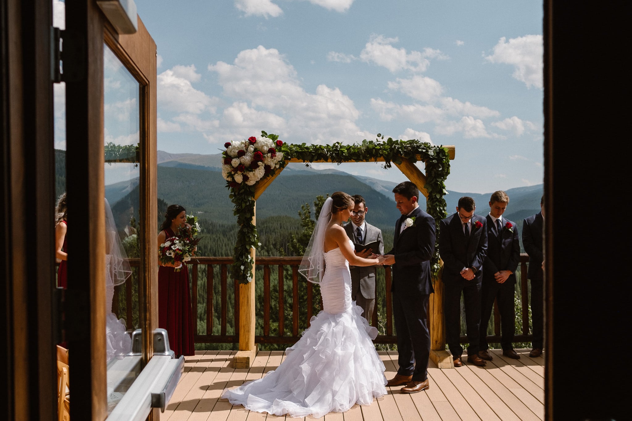 Wedding ceremony deck with mountain views in Breckenridge.