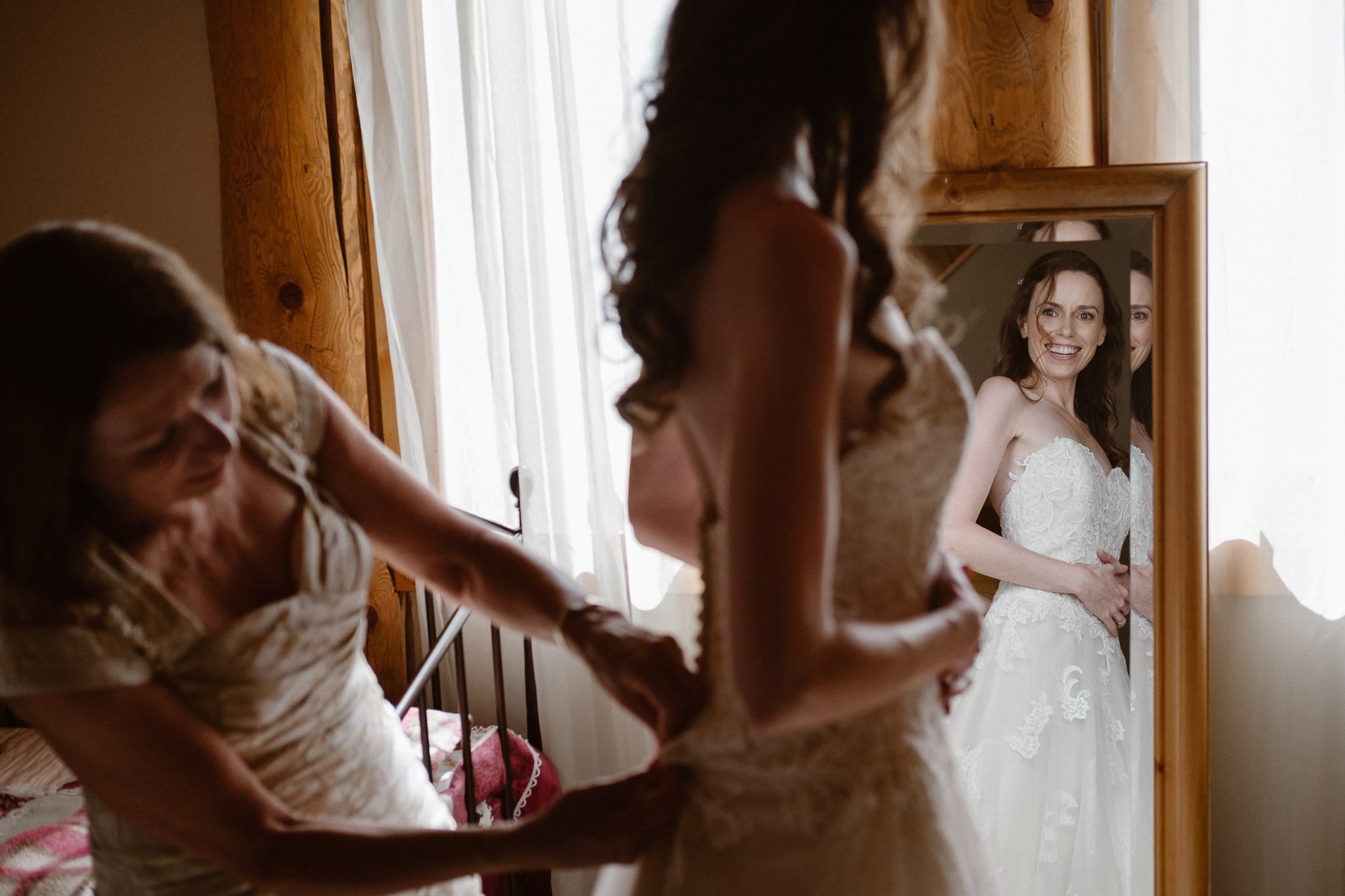 Red Feather Lakes elopement photographer, Colorado intimate cabin wedding, bride getting ready in cabin