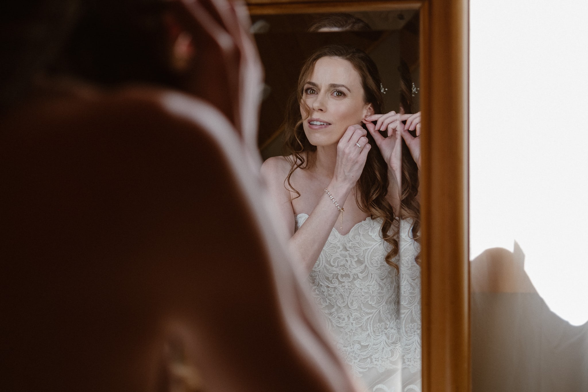 Red Feather Lakes elopement photographer, Colorado intimate cabin wedding, bride getting ready in cabin