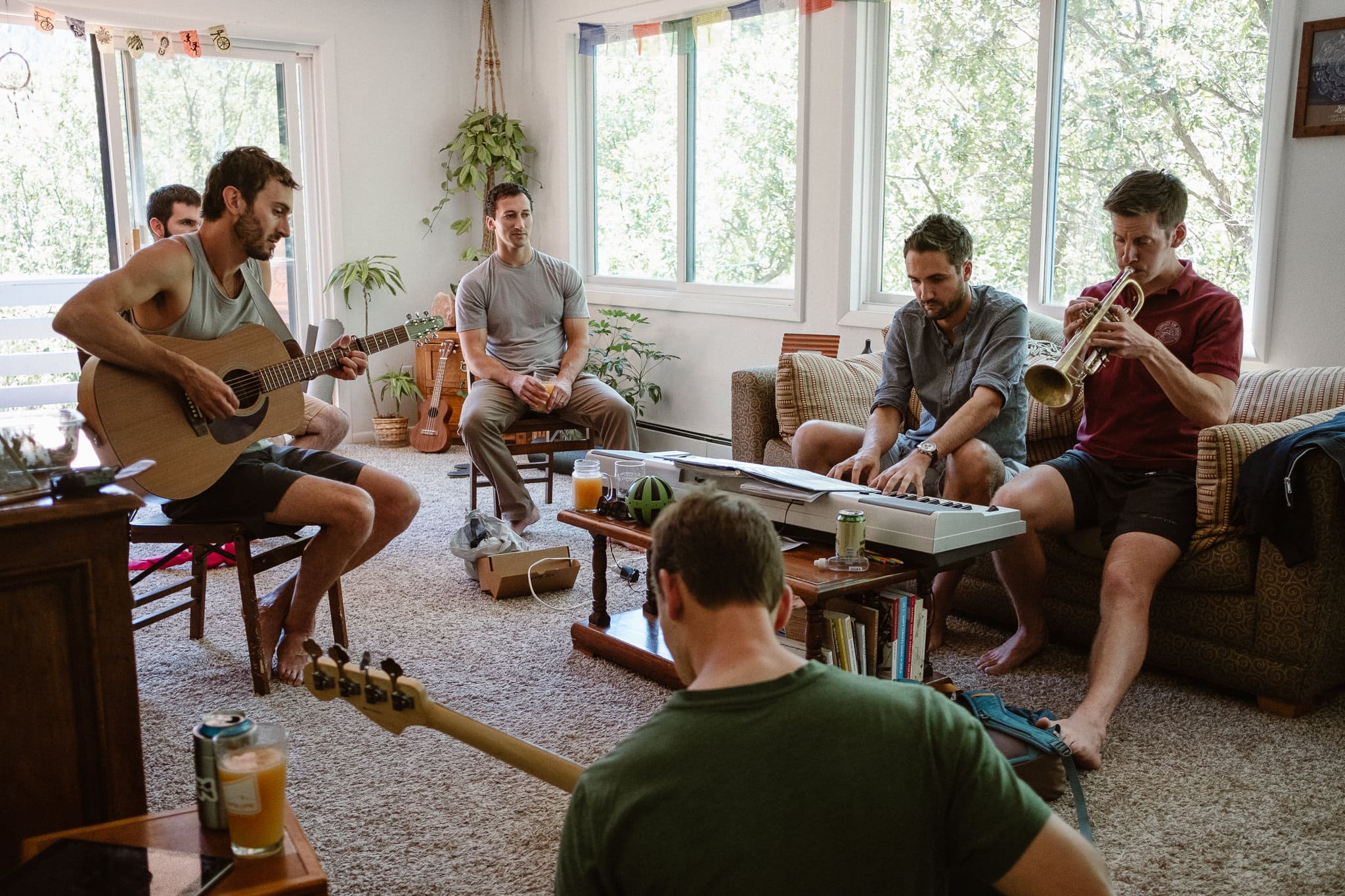 Redstone Inn wedding photographer, Carbondale wedding photographer, Colorado intimate wedding photographer, groom and groomsmen playing guitar and getting ready