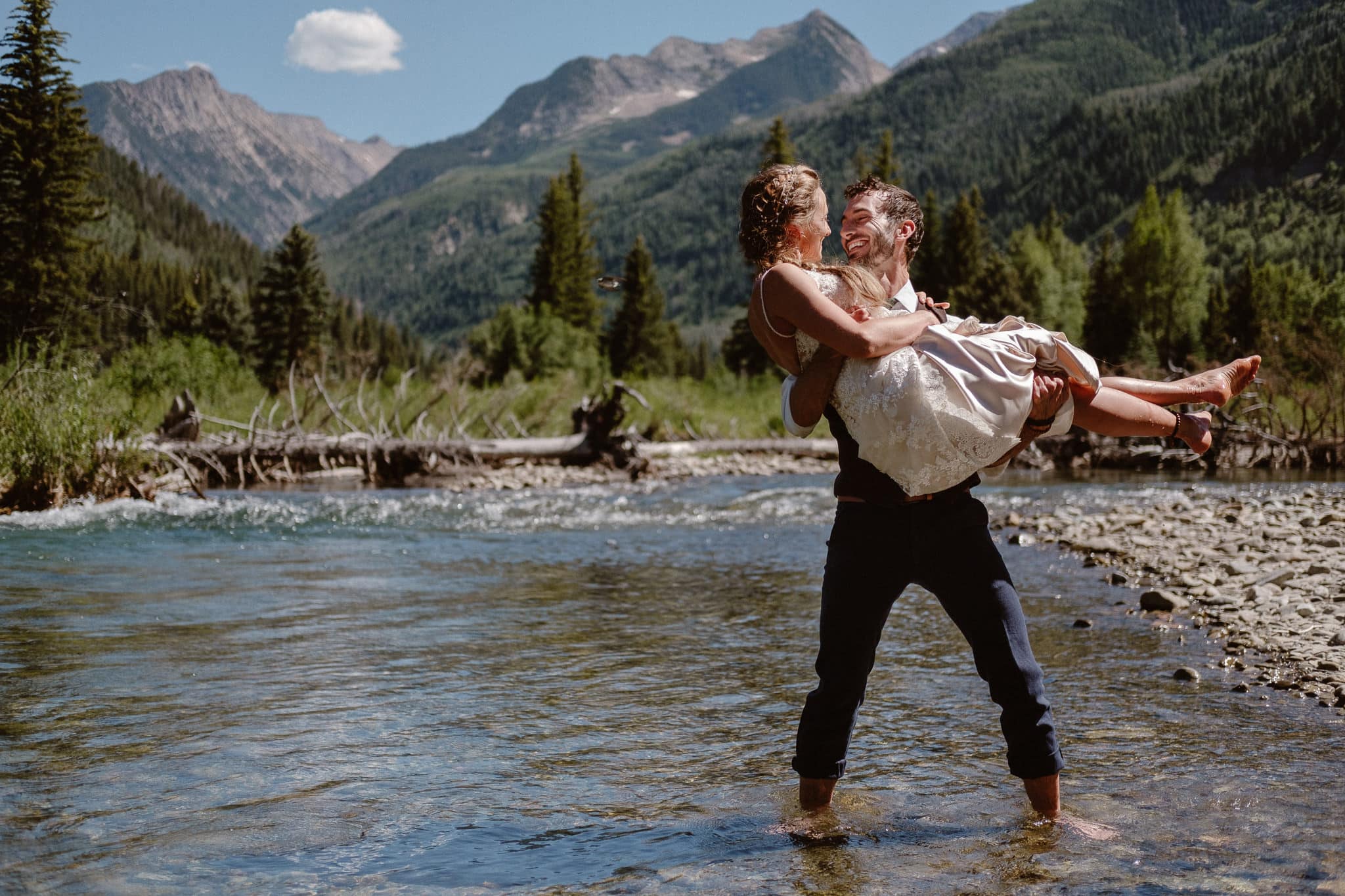 Redstone Inn wedding photographer, Carbondale wedding photographer, Colorado intimate wedding photographer, bride and groom portraits by river in mountains