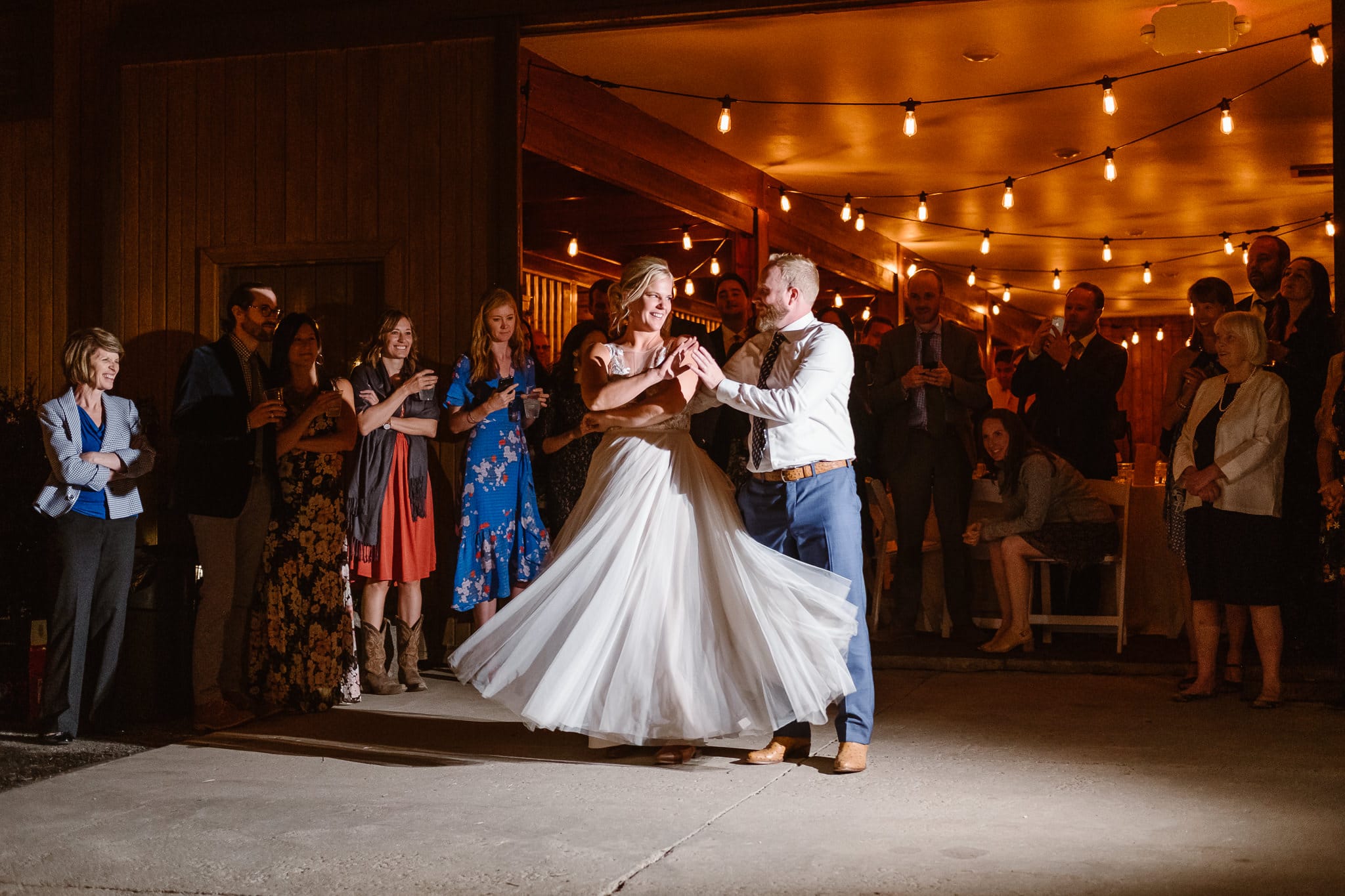 Steamboat Springs wedding photographer, La Joya Dulce wedding, Colorado ranch wedding venues, bride and groom first dance under market lights
