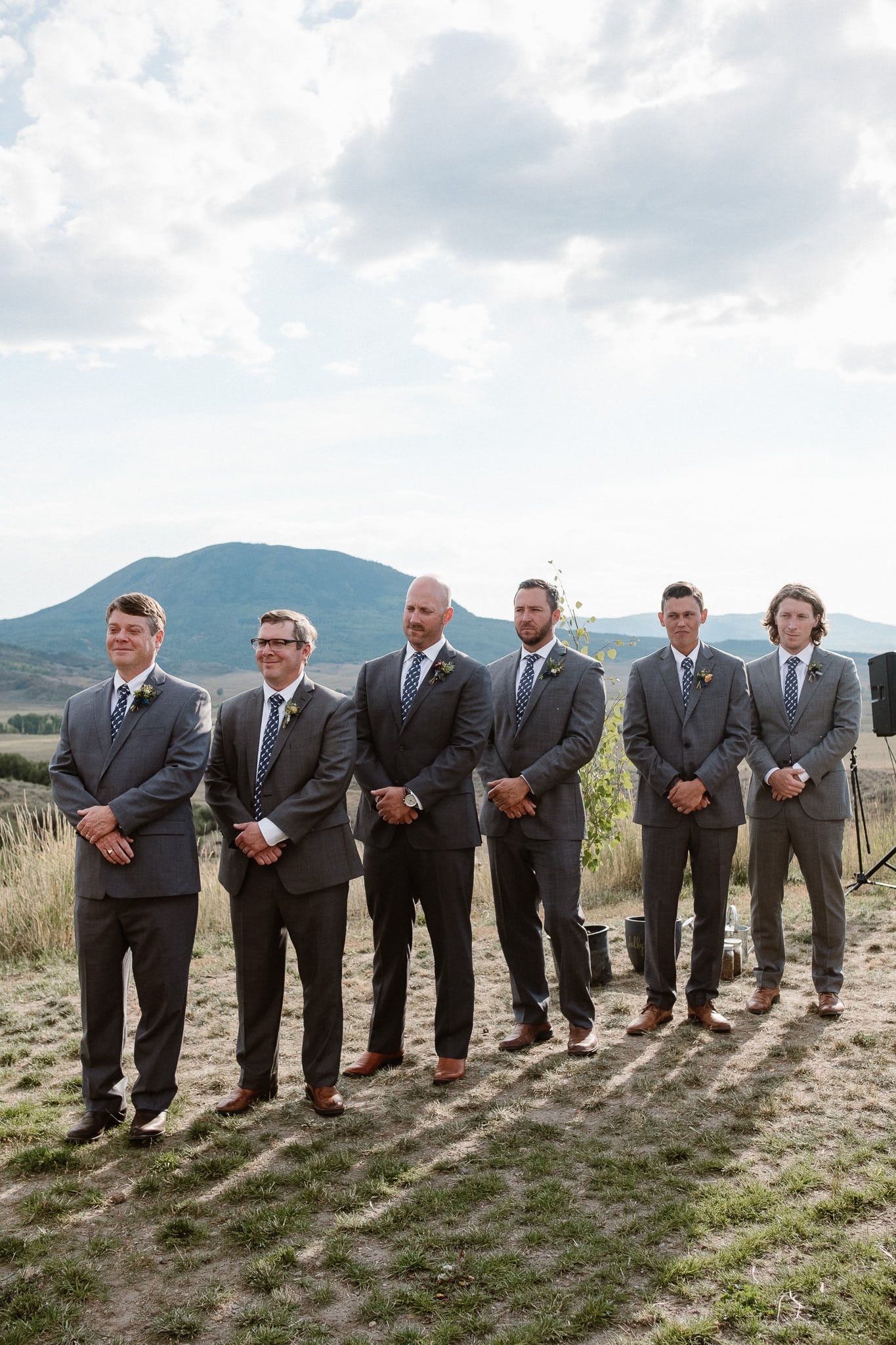 Steamboat Springs wedding photographer, La Joya Dulce wedding, Colorado ranch wedding venues, outdoor wedding ceremony, groomsmen during wedding ceremony