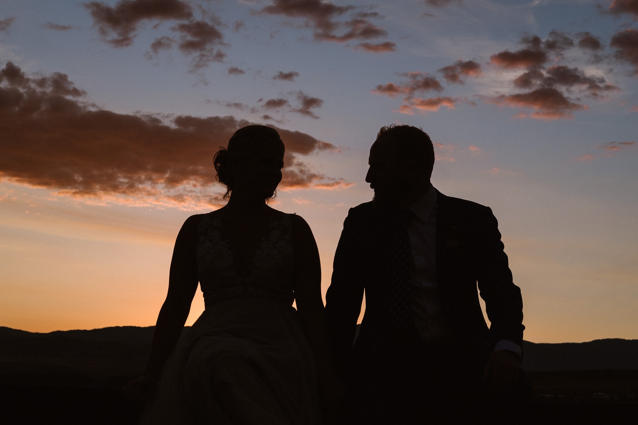 Steamboat Springs wedding photographer, La Joya Dulce wedding, Colorado ranch wedding venues, bride and groom portraits at sunset, bride and groom silhouettes at sunset