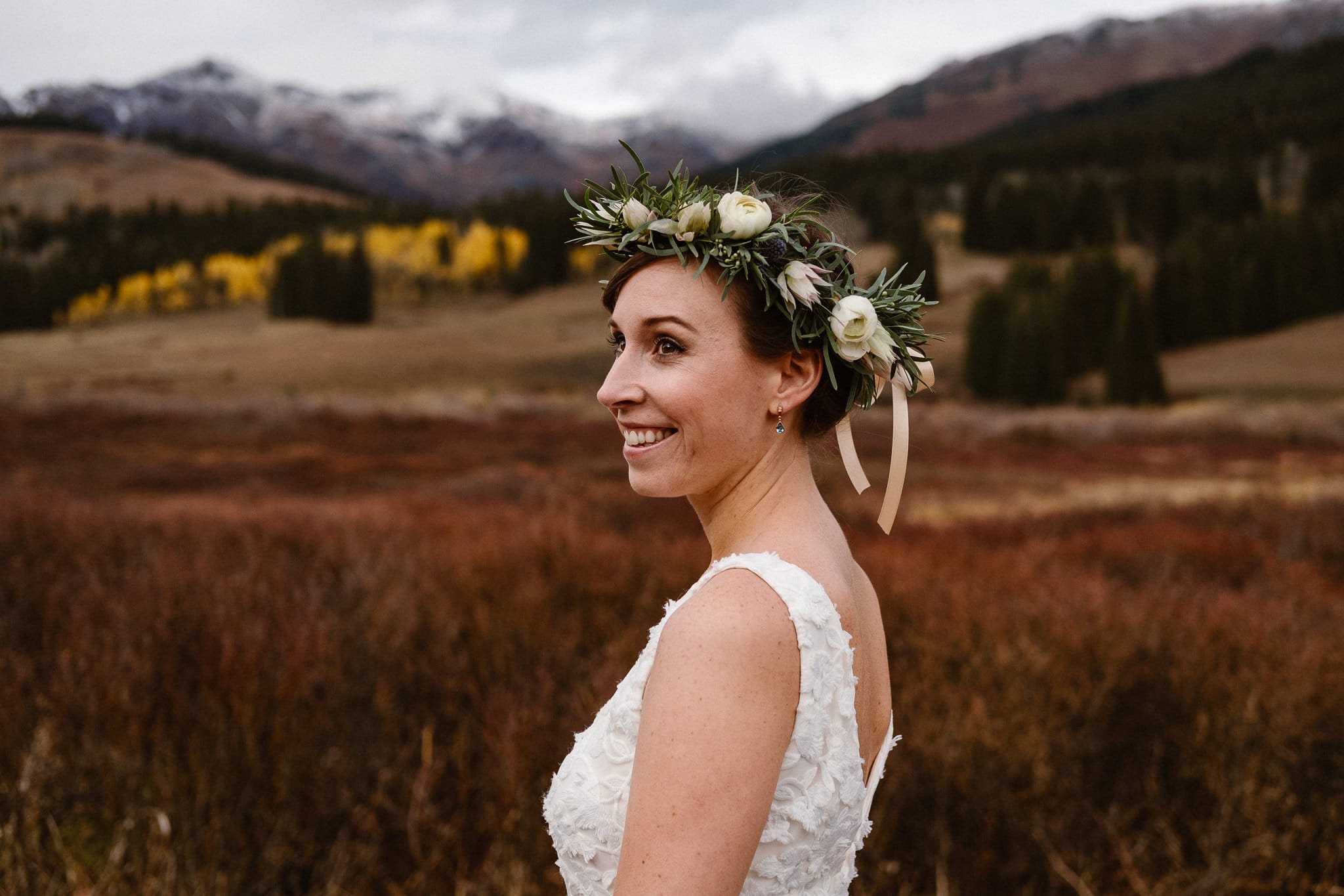 Crested Butte Wedding Photographer, Scarp Ridge Lodge intimate elopement, self solemnized elopement in Colorado, bride and groom portraits, Colorado mountain adventure wedding, bride wearing floral crown