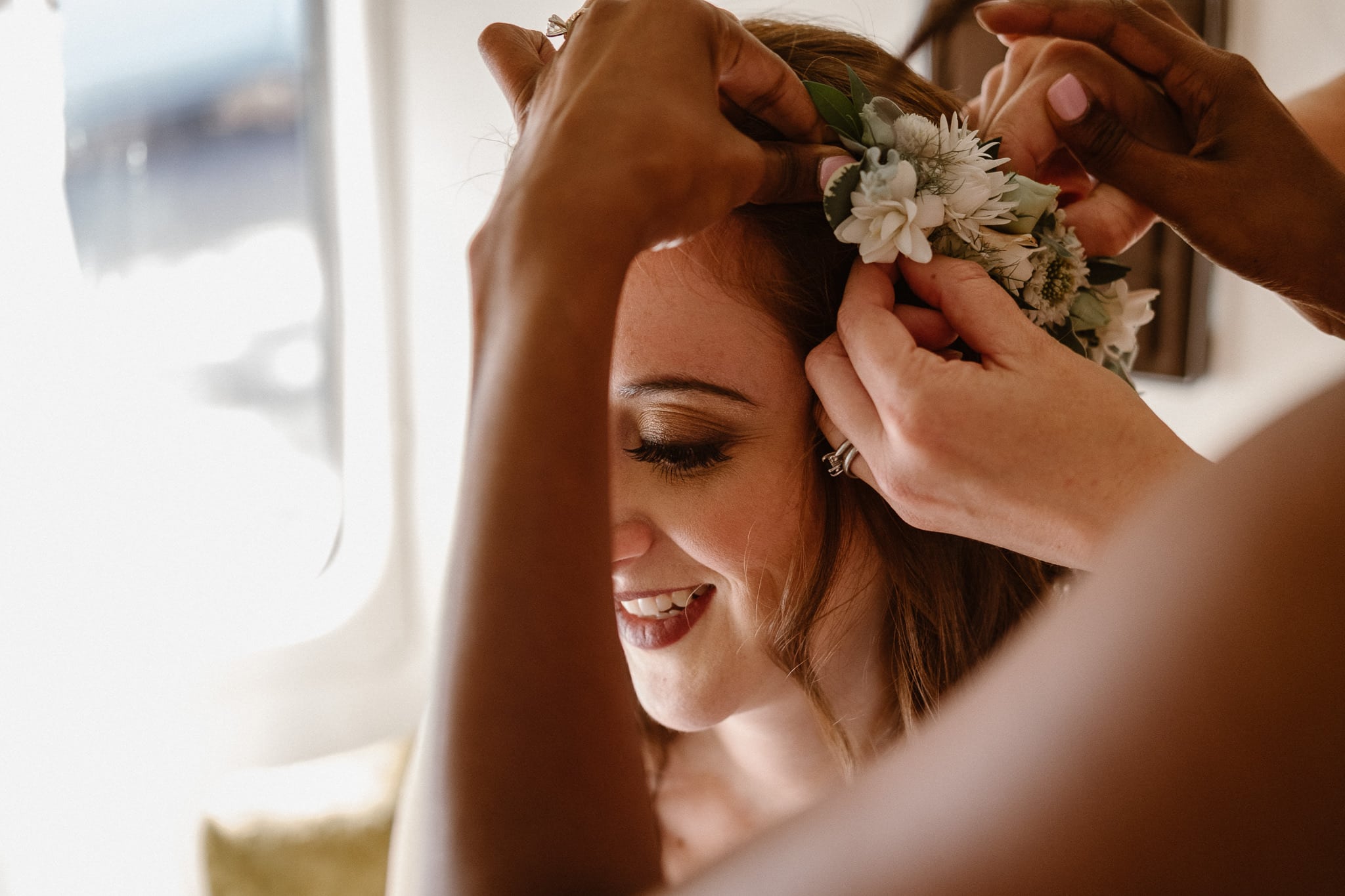 Lyons Farmette wedding photographer, Colorado intimate wedding photographer, bride getting ready in airstream, floral head piece