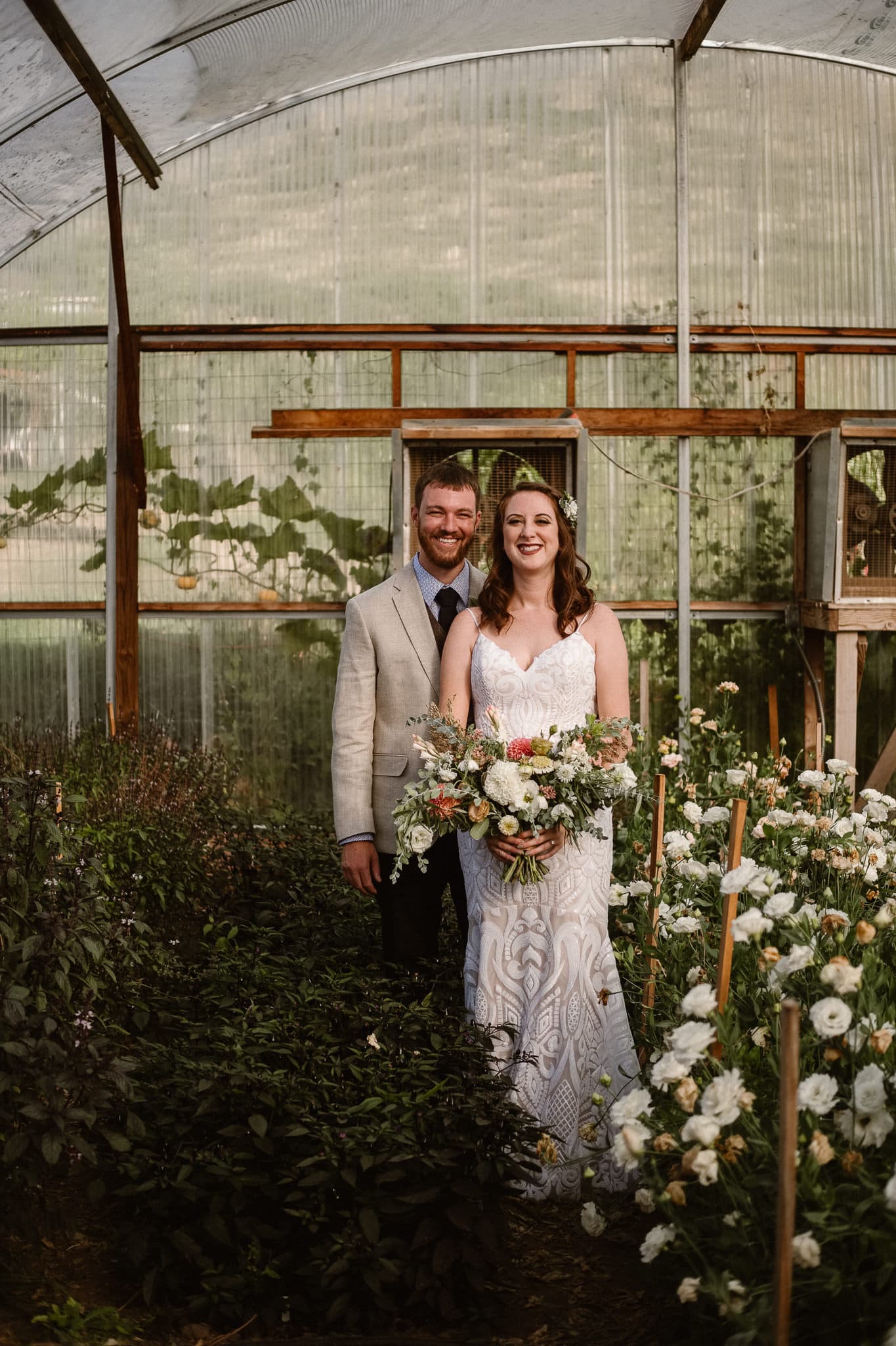 Lyons Farmette wedding photographer, Colorado intimate wedding photographer, bride and groom photos in greenhouse