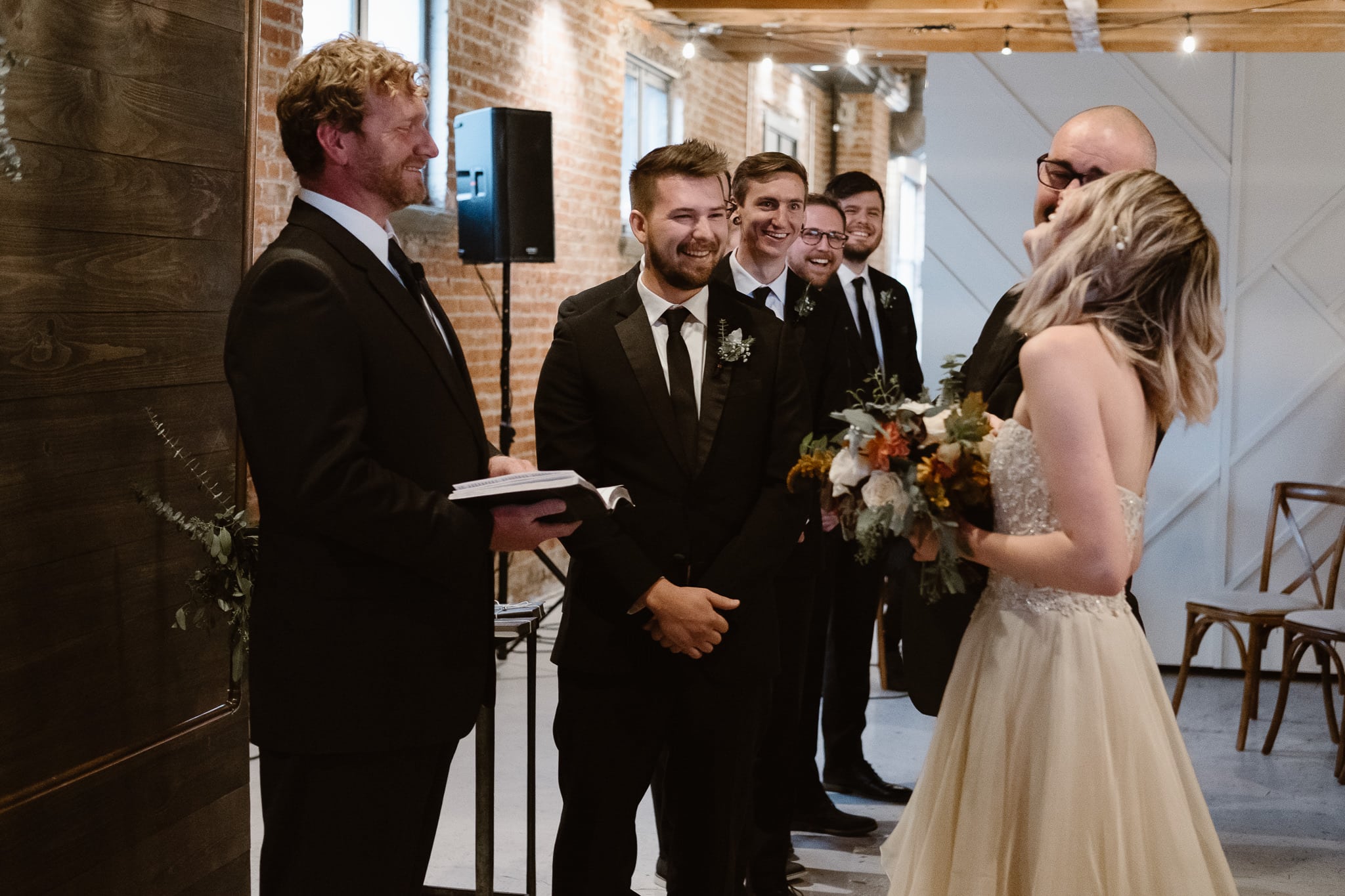 St Vrain Wedding Photographer | Longmont Wedding Photographer | Colorado Winter Wedding Photographer, Colorado industrial chic wedding ceremony, bride walking down aisle with her father