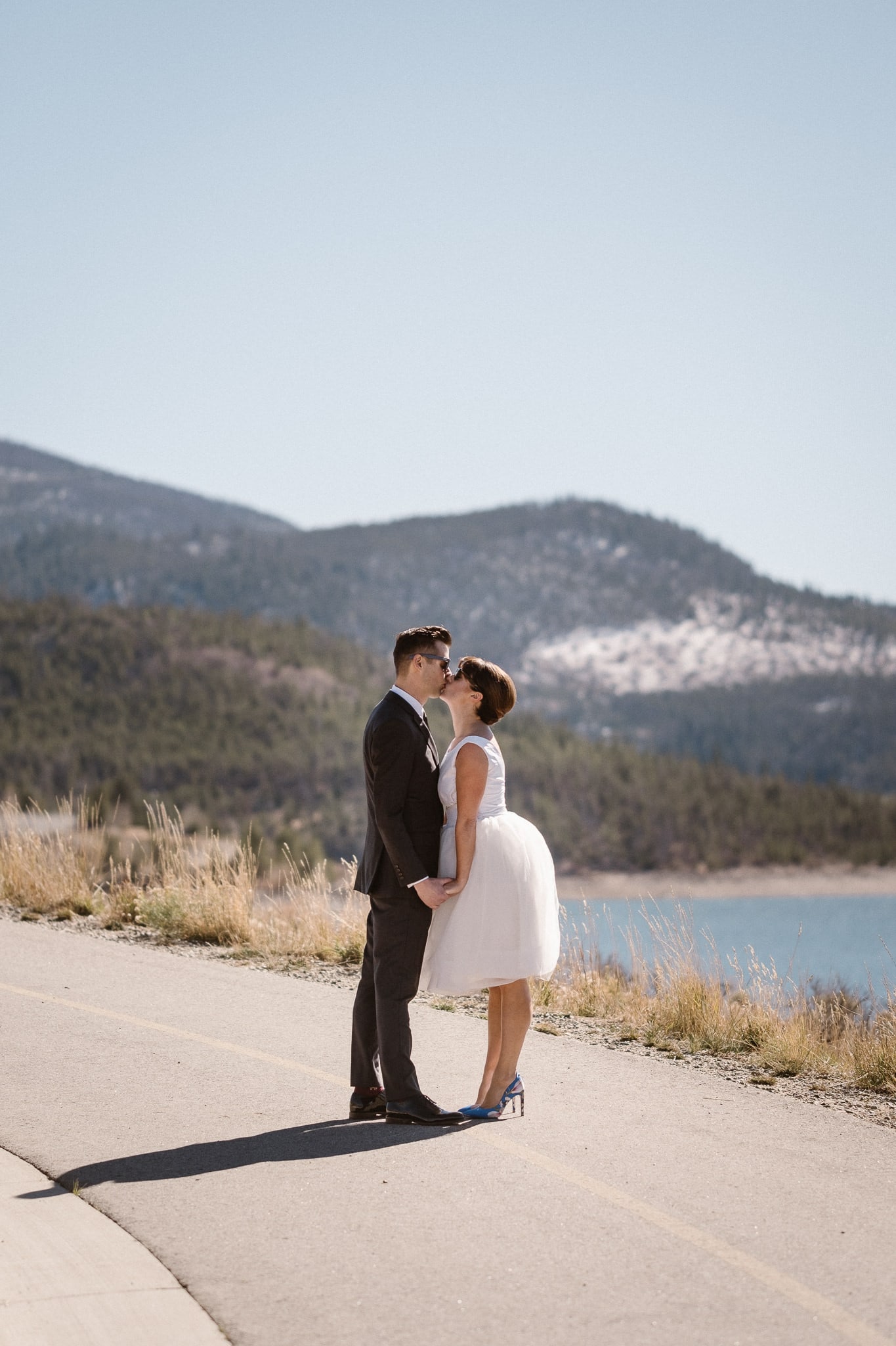 Bride and groom portraits at Lake Dillon in Summit County for Silverthorne Pavilion wedding, Colorado wedding photographer, mountain wedding, winter wedding