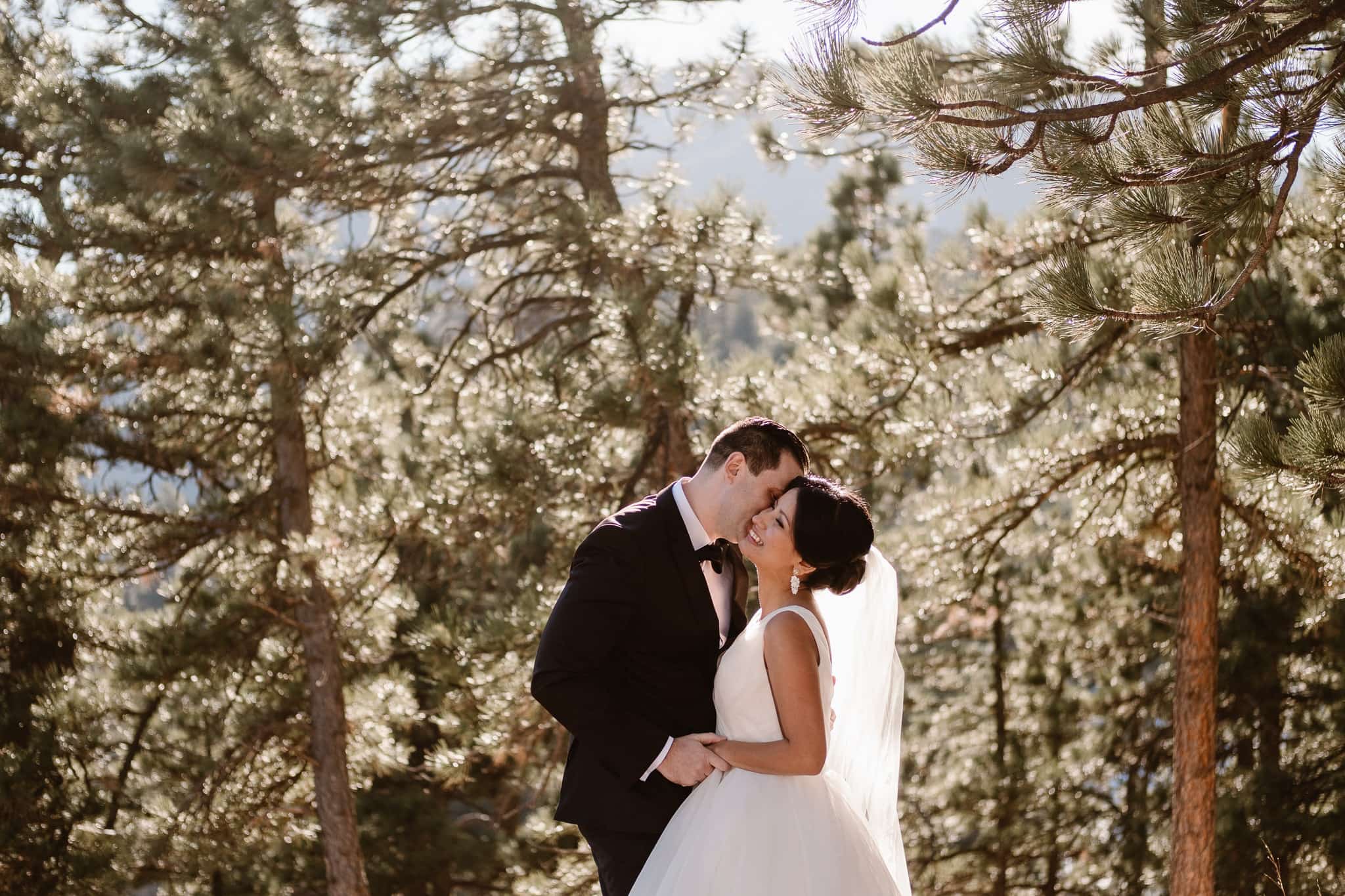 Bride and groom portraits in the trees at Flagstaff Mountain , Boulder wedding photographer, Colorado wedding photographer, St Julien wedding with mountain wedding photos