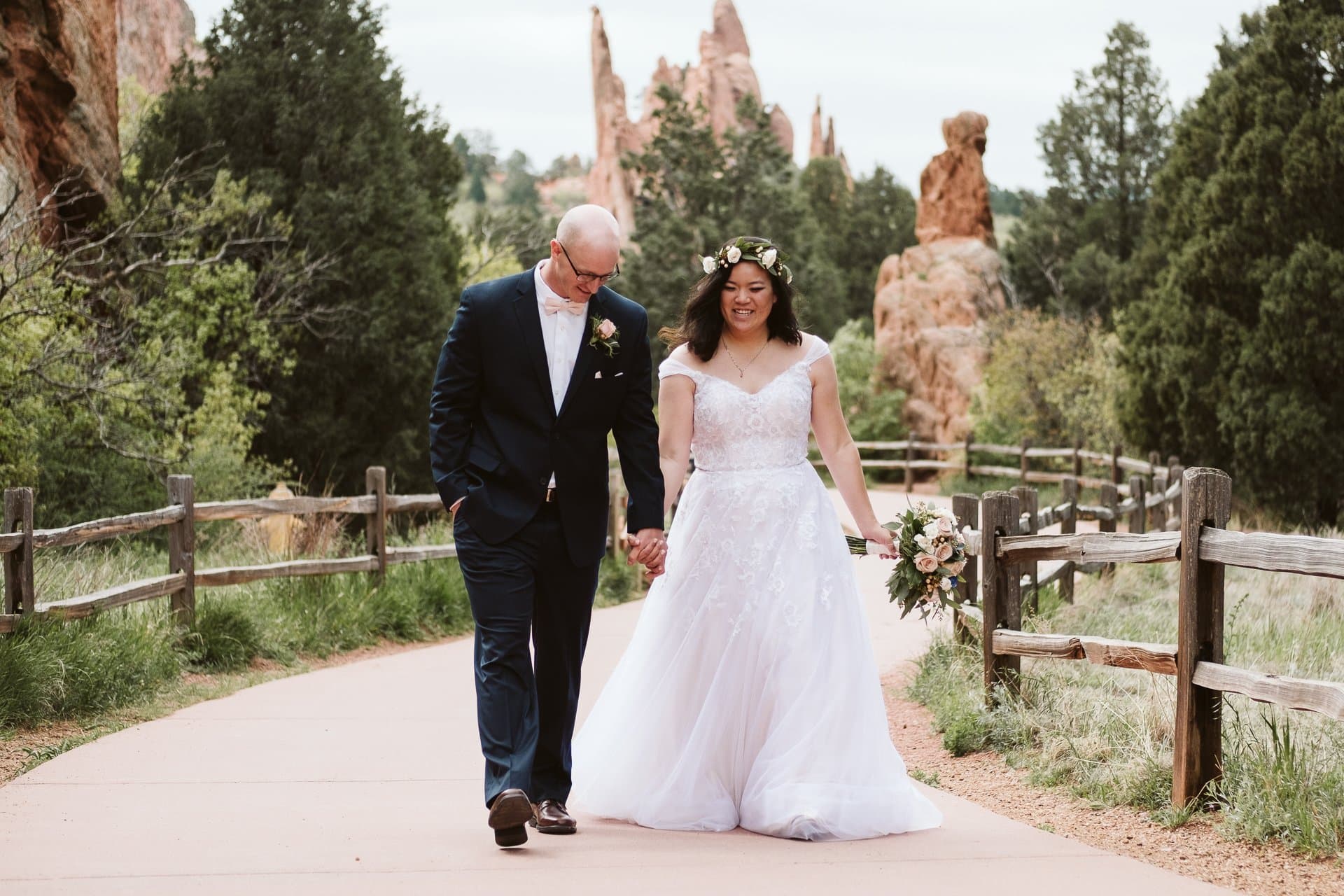 Bride and groom wedding photos at Garden of the Gods in Colorado with jagged red rocks