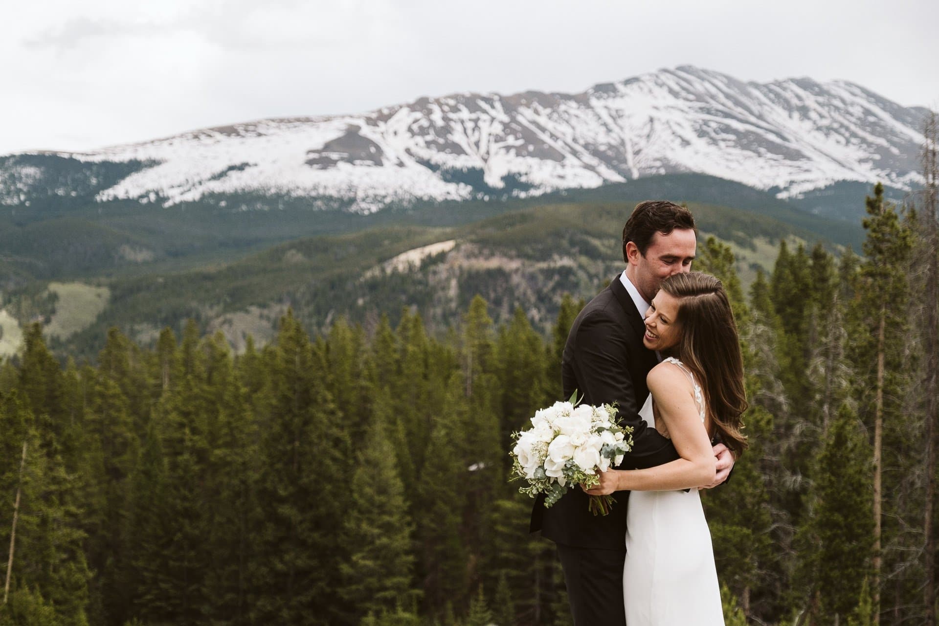 Bride and groom portraits at Ten Mile Station, Breckenridge ski resort wedding, Colorado mountain wedding photographer