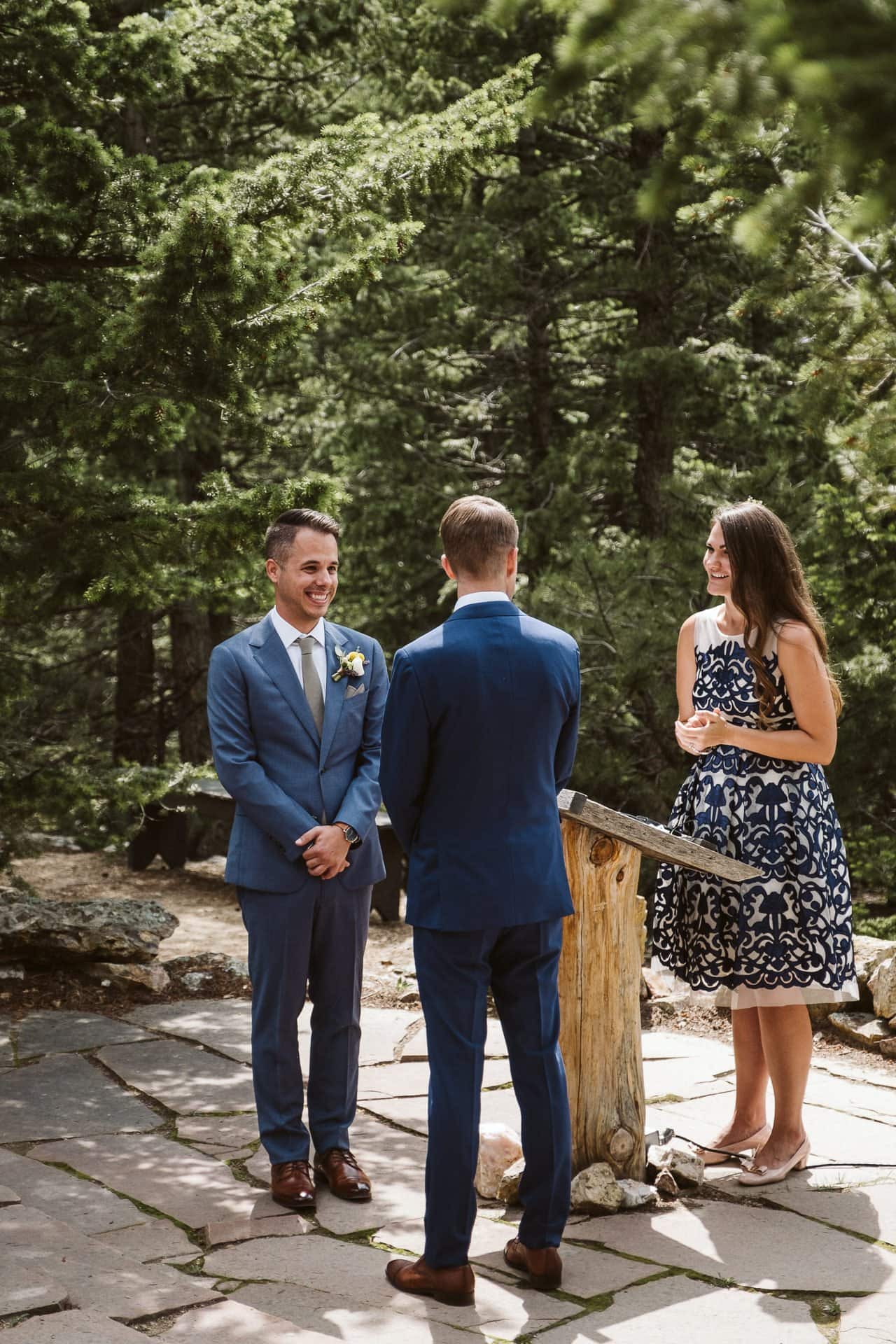 Wedding ceremony at Colorado Mountain Ranch outside Boulder, gay wedding in Colorado