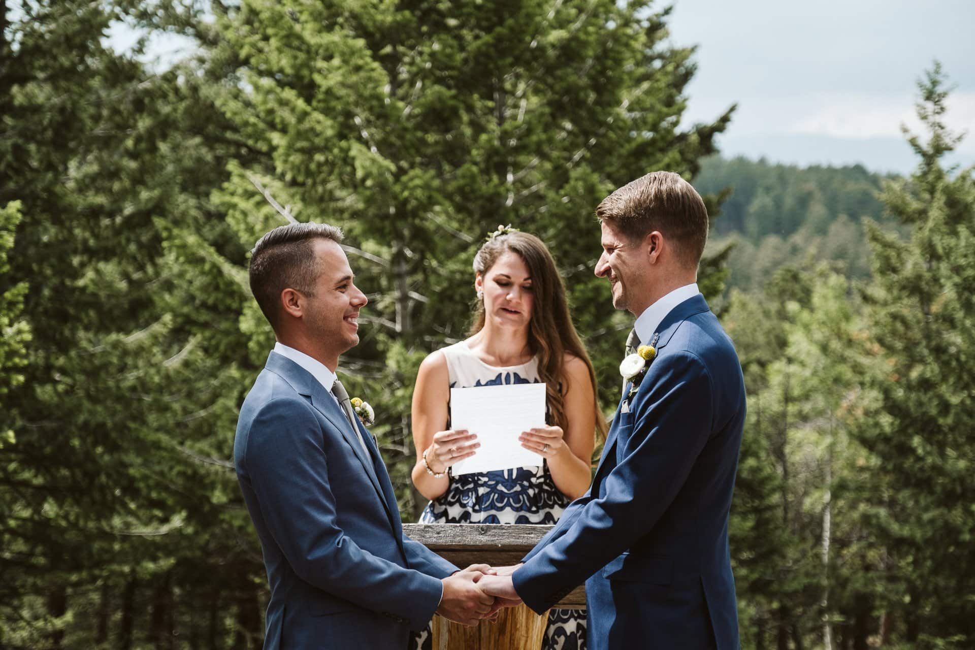 Wedding ceremony at Colorado Mountain Ranch outside Boulder, gay wedding in Colorado