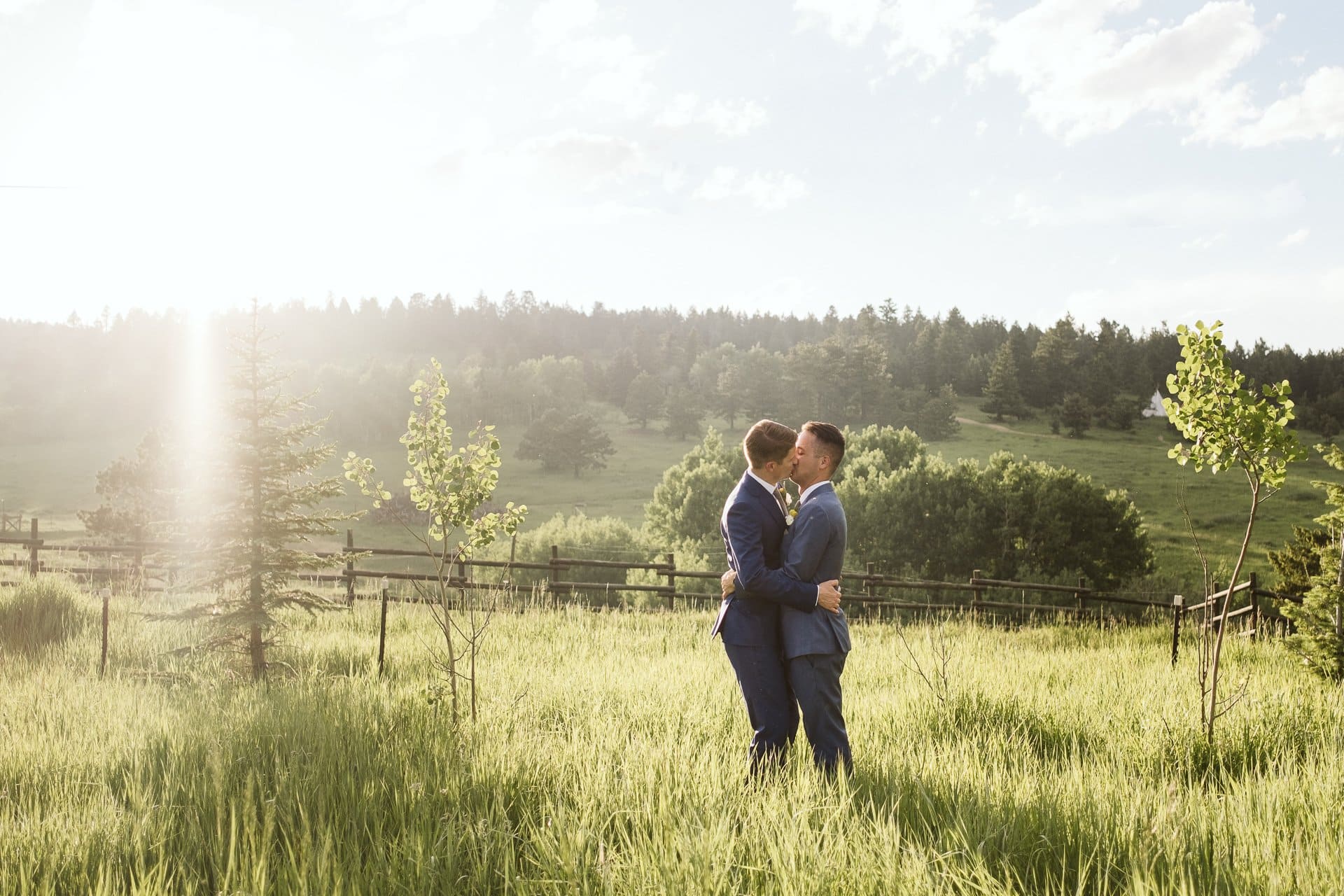 Grooms wedding portraits in golden hour at Colorado Mountain Ranch in Boulder County, same sex wedding photography