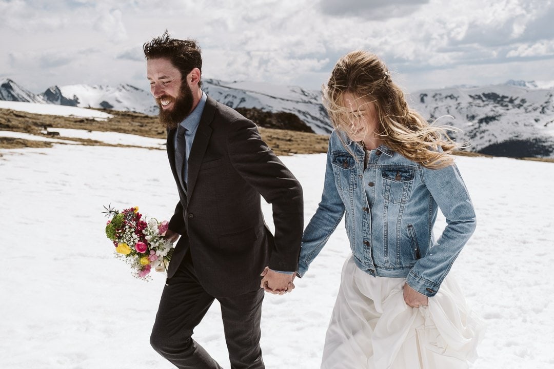 Bride and groom wedding photos at Trail Ridge Road, Rocky Mountain National Park elopement photographer, Colorado winter elopement