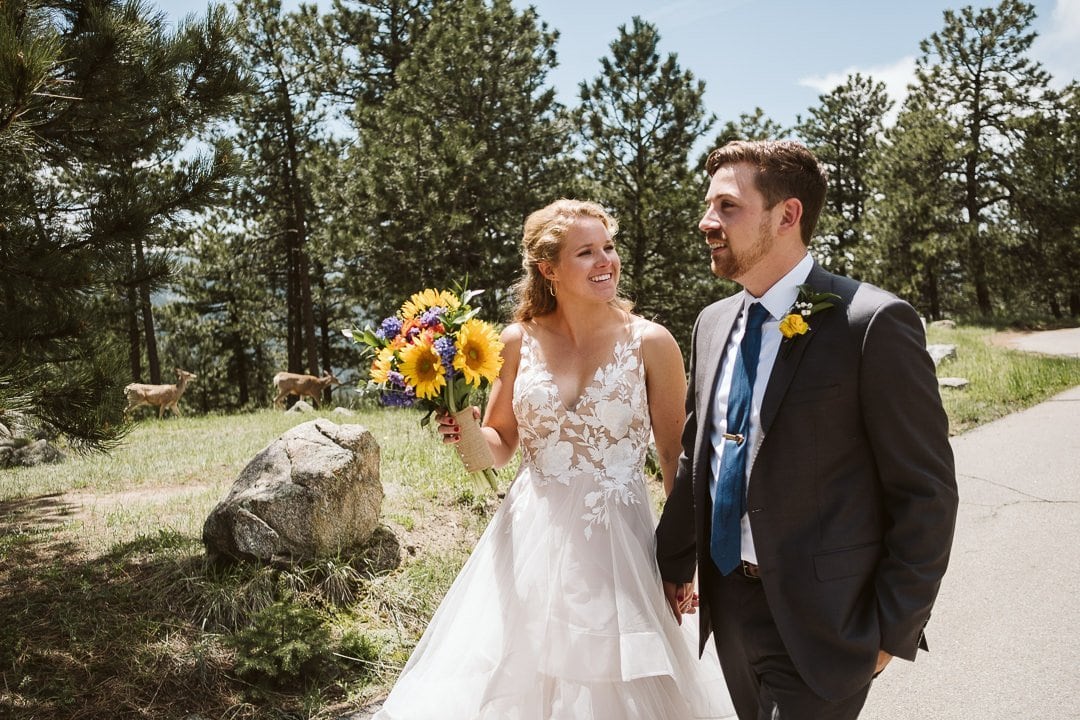 Bride and groom portraits at Flagstaff Mountain in Boulder after Sunrise Amphitheater wedding ceremony, Boulder wedding photographer, bride in BHLDN dress with sunflower bouquet