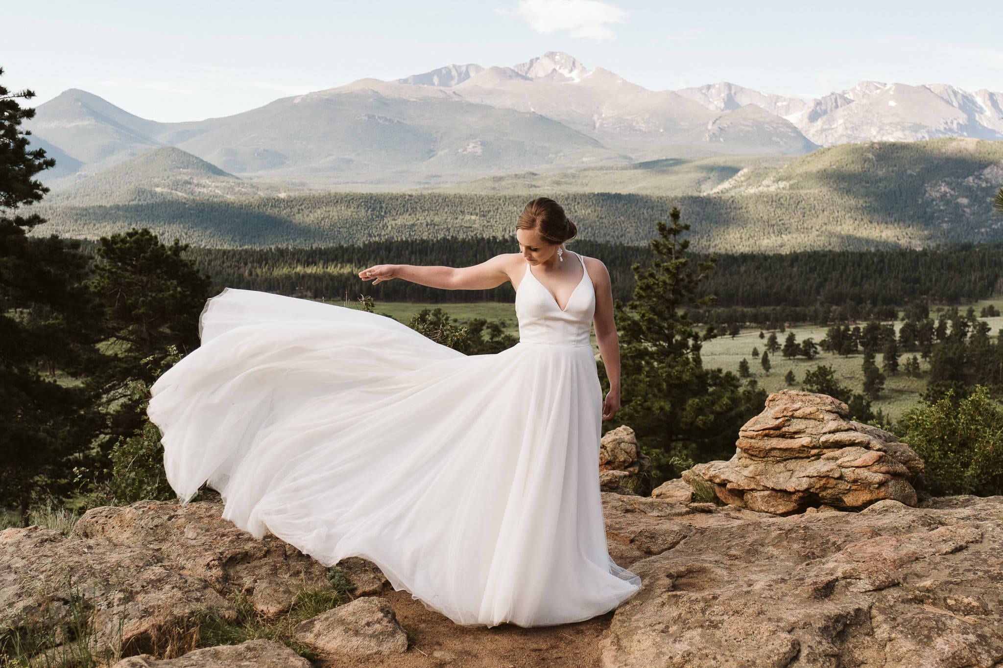 Bride in flowy dress with chiffon skirt, wedding dress for hiking elopement, Colorado wedding photographer