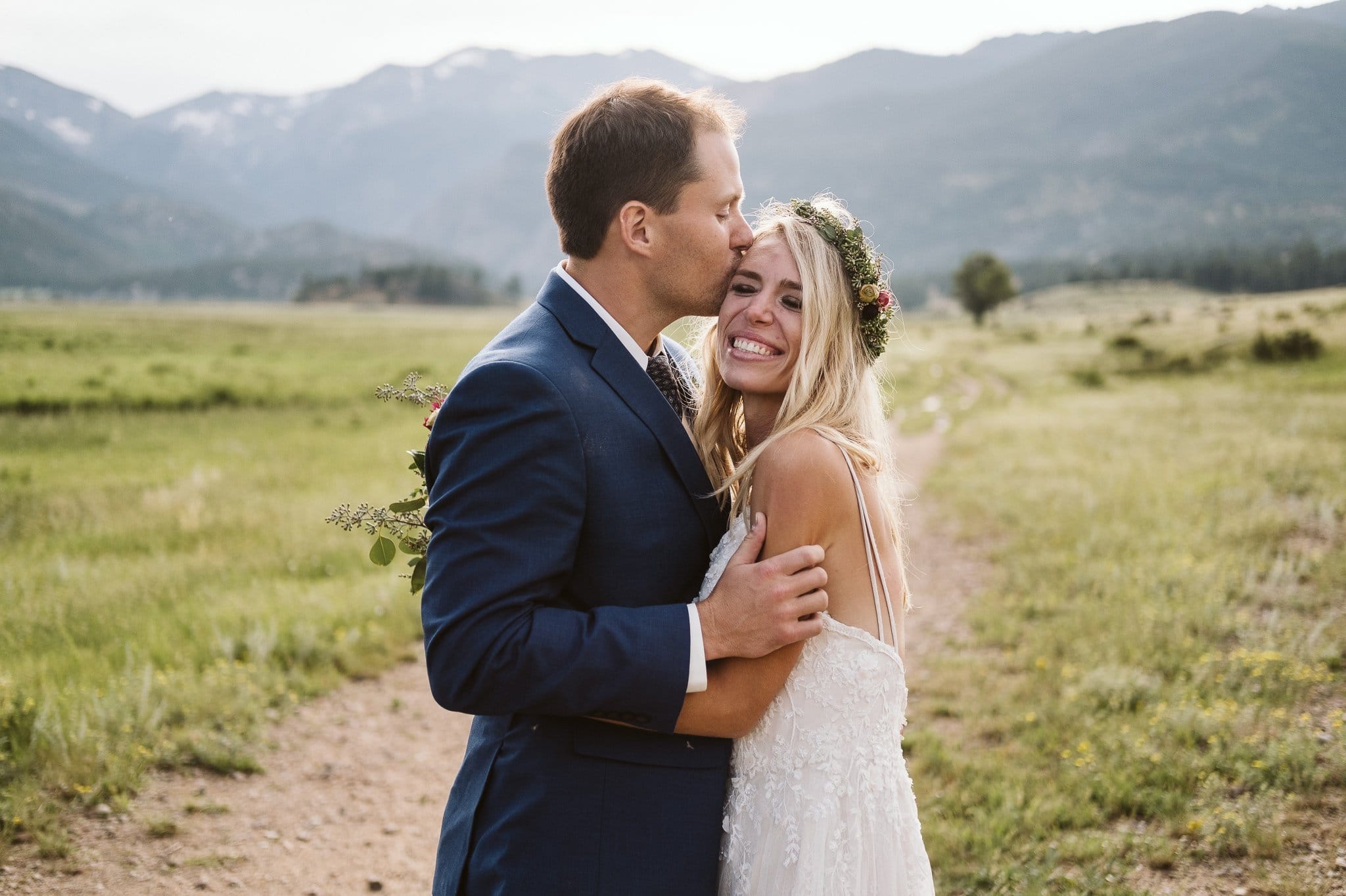 Bride and groom hiking in Moraine Valley for Rocky Mountain National Park elopement, Colorado elopement photographer, adventure elopement