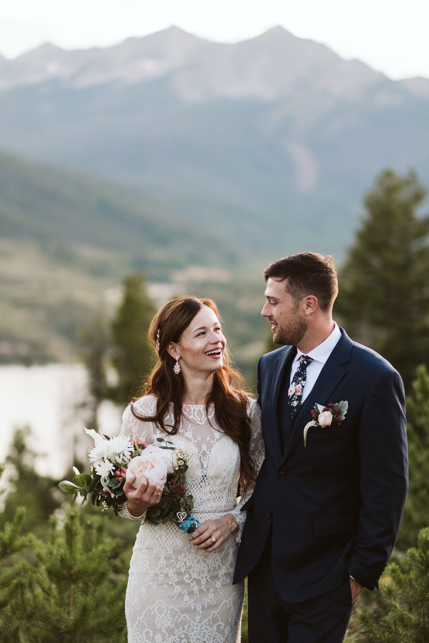 Bride and groom wedding portraits at Sapphire Point in Dillon, Colorado mountain wedding photos