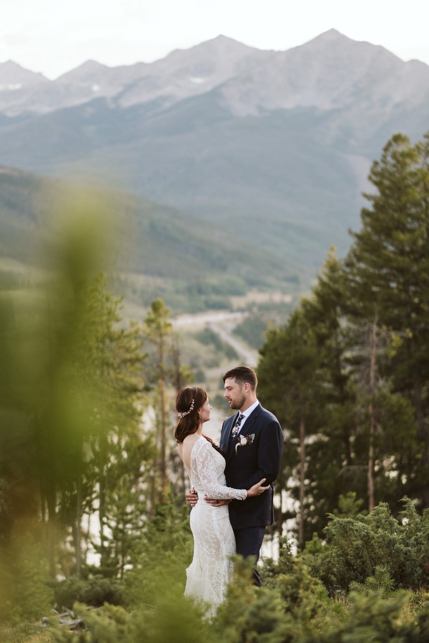 Bride and groom wedding portraits at Sapphire Point in Dillon, Colorado mountain wedding photos