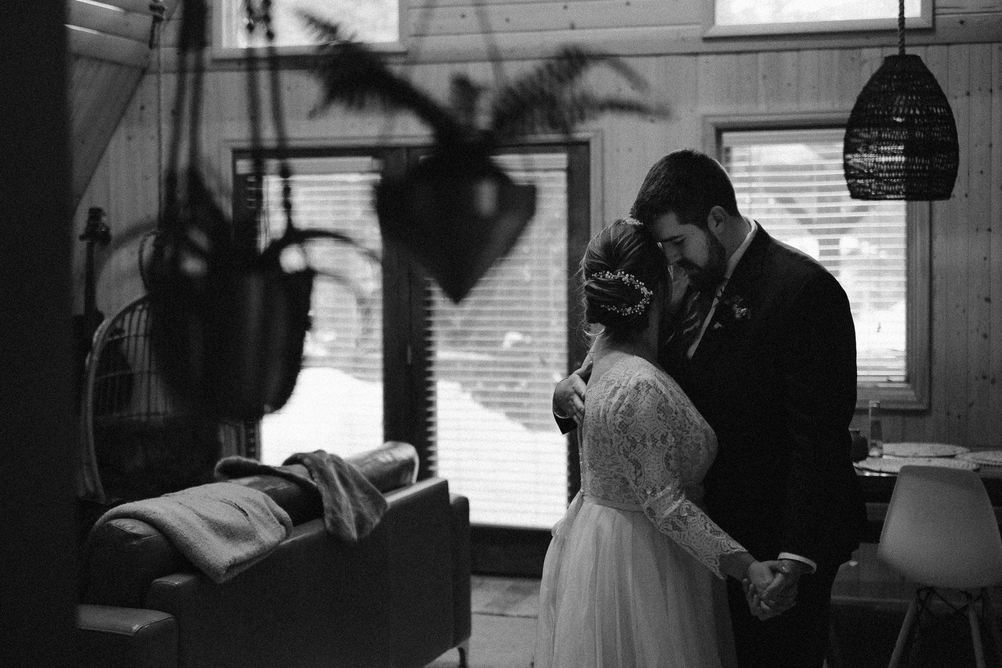 First dance in front of the fireplace at A-frame cabin in Colorado.