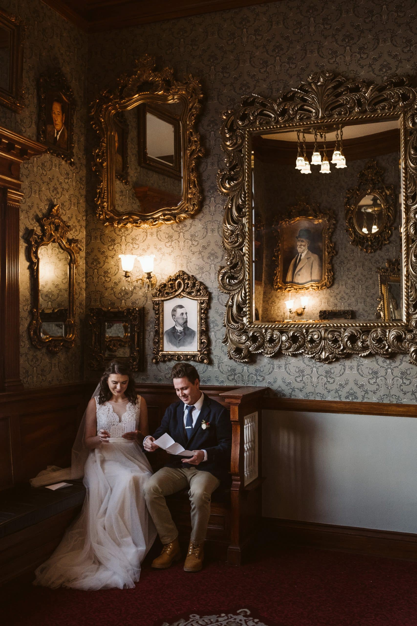 Bride and groom read private letters to each other at the Stanley Hotel in Estes Park.