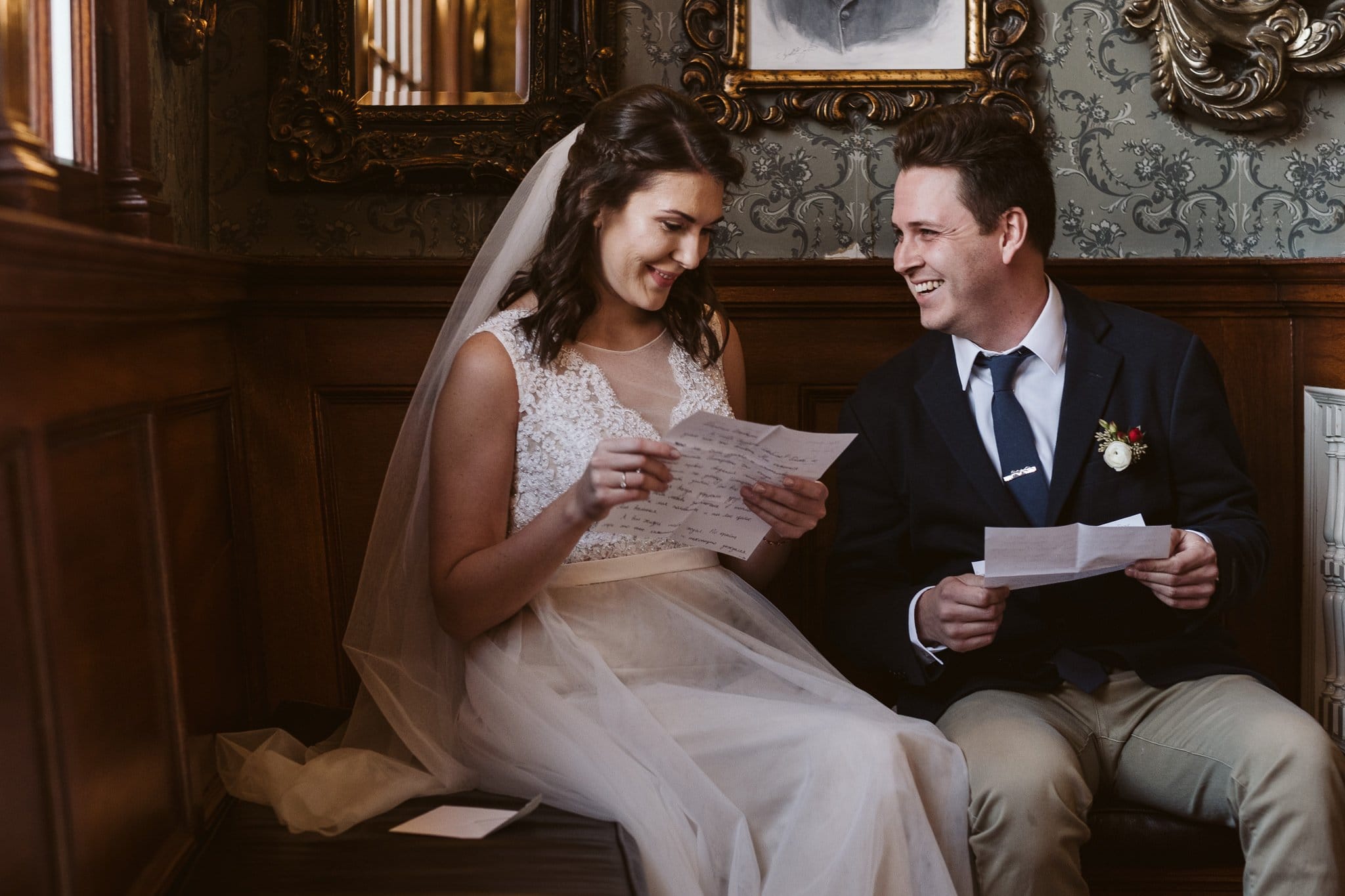 Bride and groom read private letters to each other at the Stanley Hotel in Estes Park.