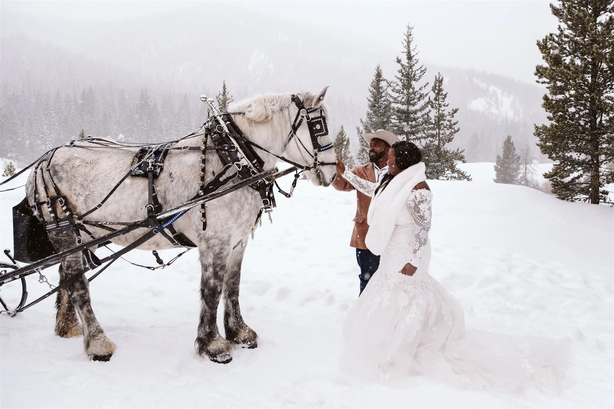 Snowy sleigh ride elopement in Colorado