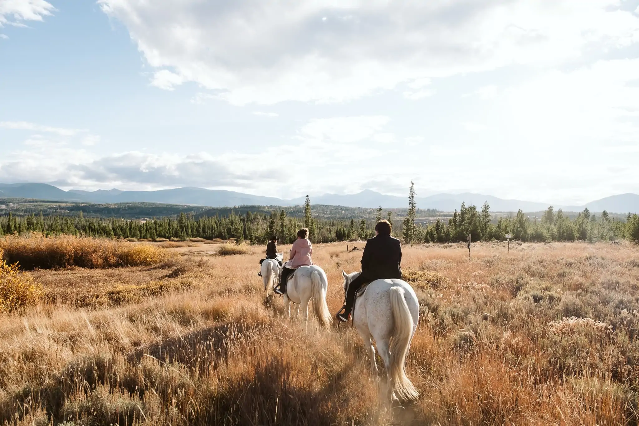 Horseback riding elopement at Devil's Thumb Ranch in Colorado