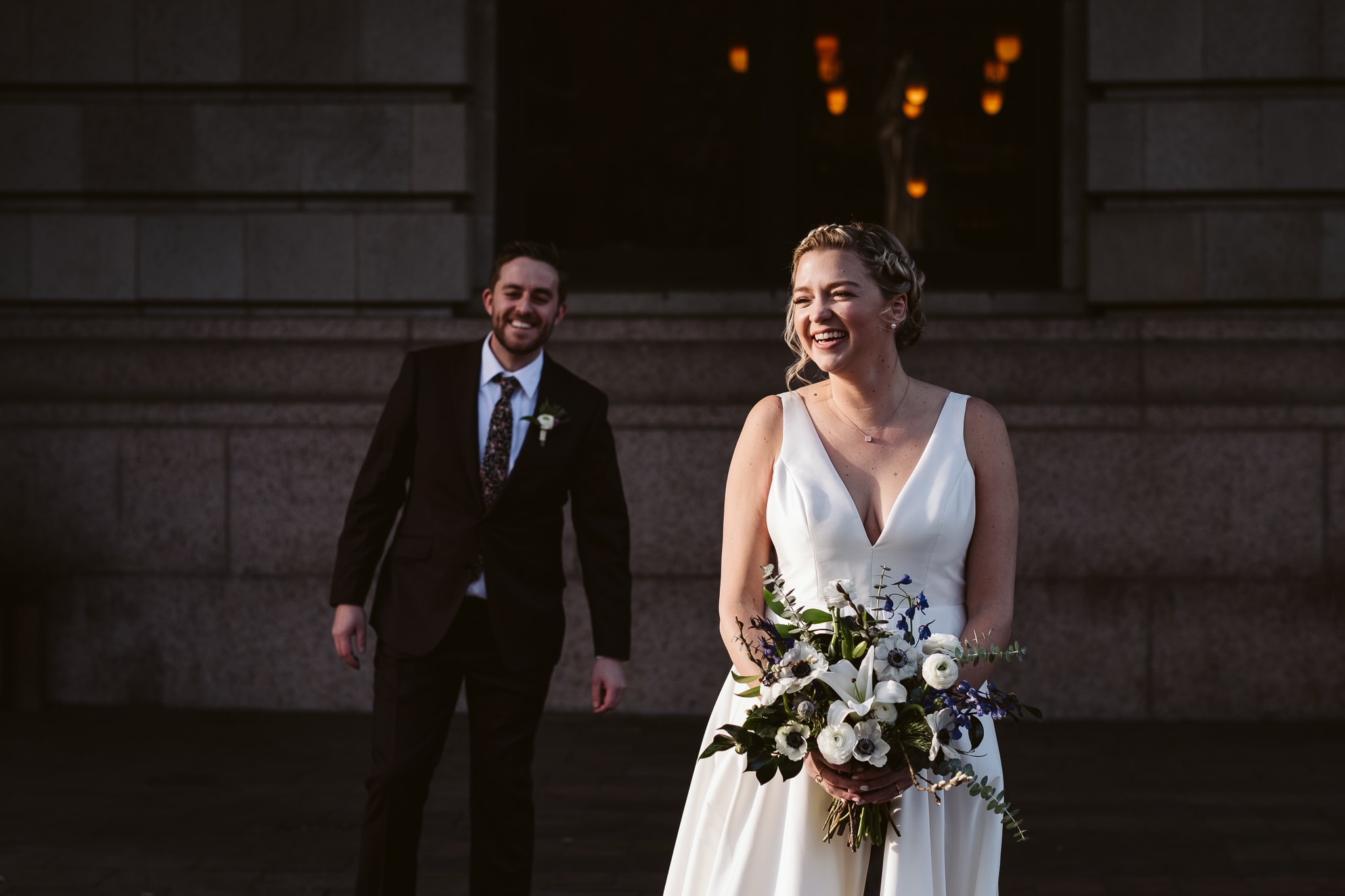 Bride and groom portraits in front of the Union Station Denver wedding venue