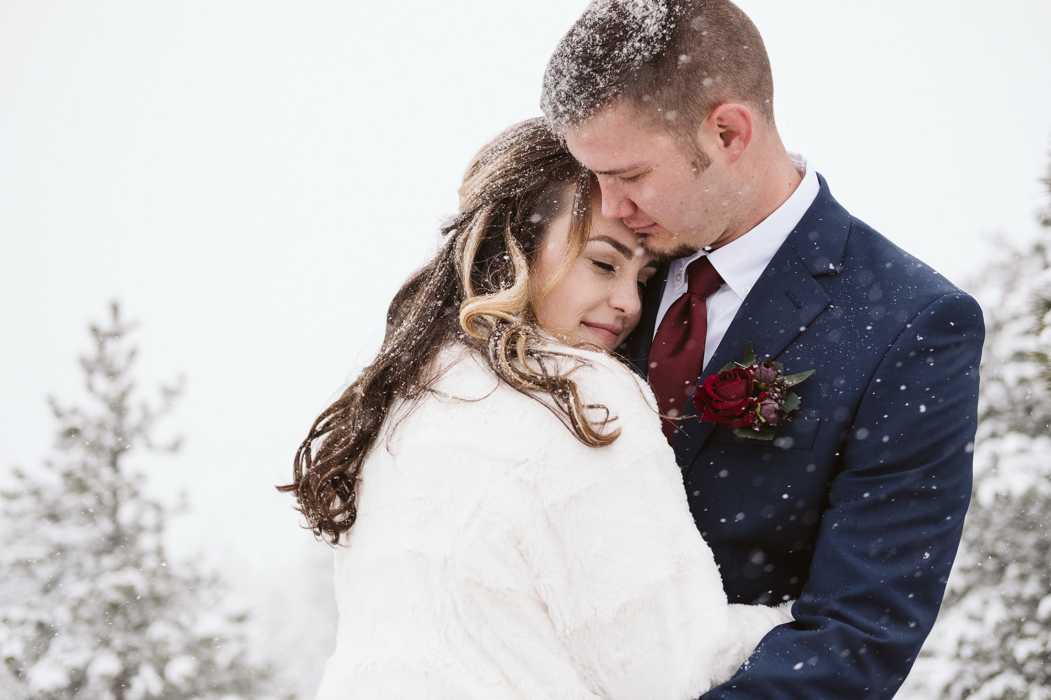 Snowy weather winter elopement in Rocky Mountain National Park