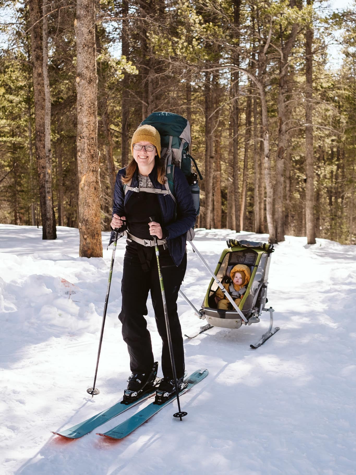 Nina backcountry skiing with her daughter