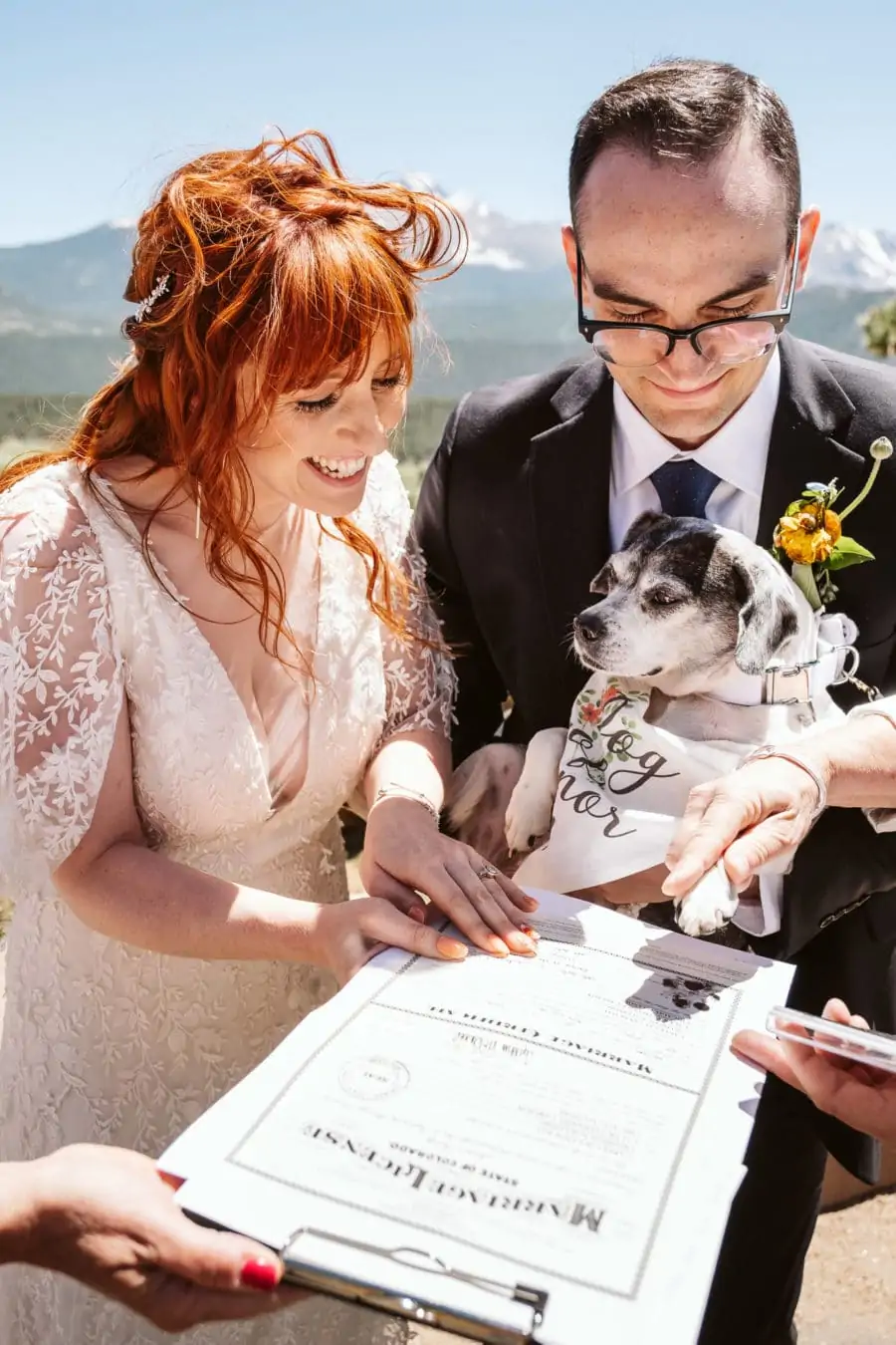 Dog signs marriage license in Colorado