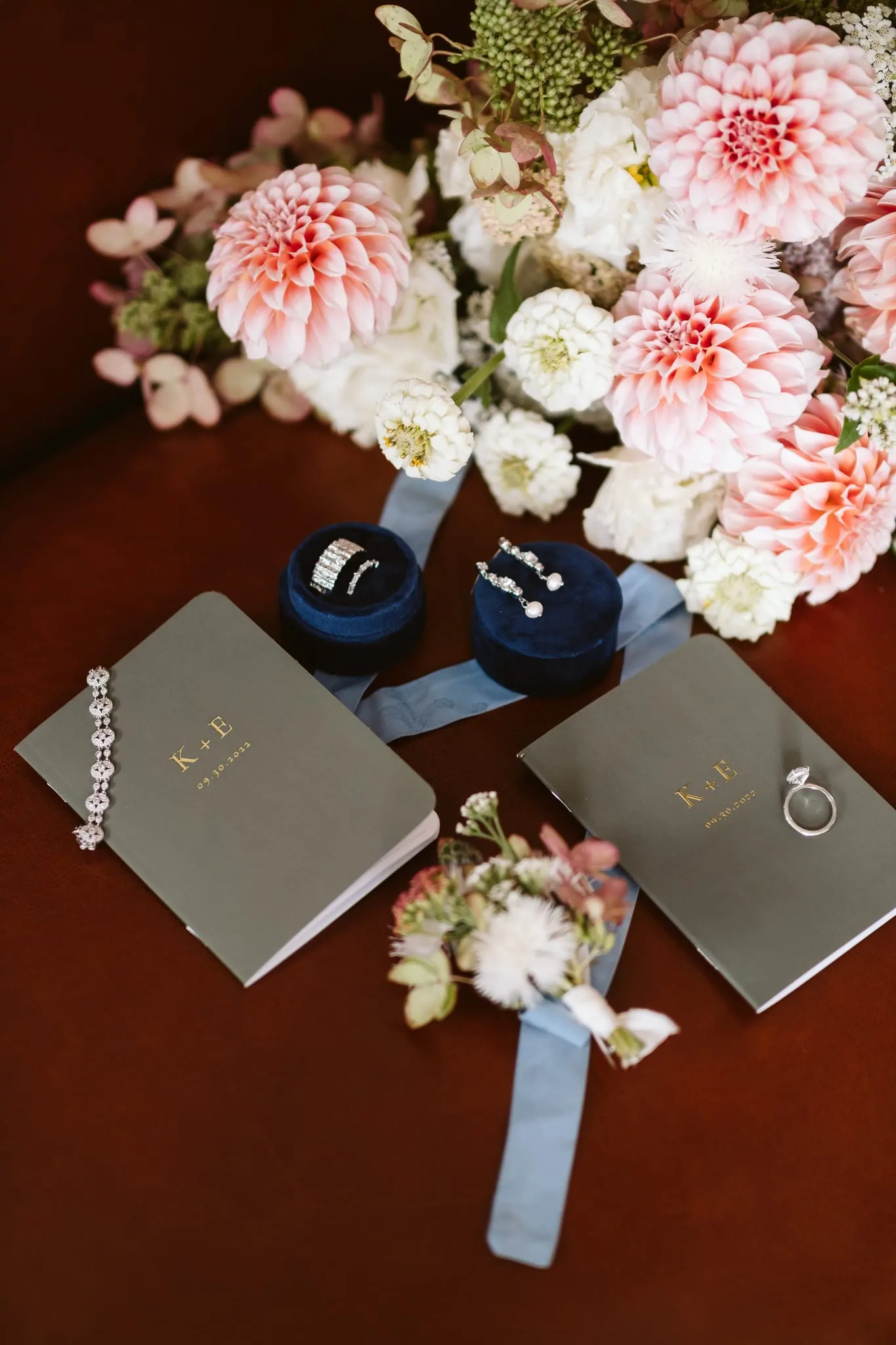 Elopement details with vow books and ring box