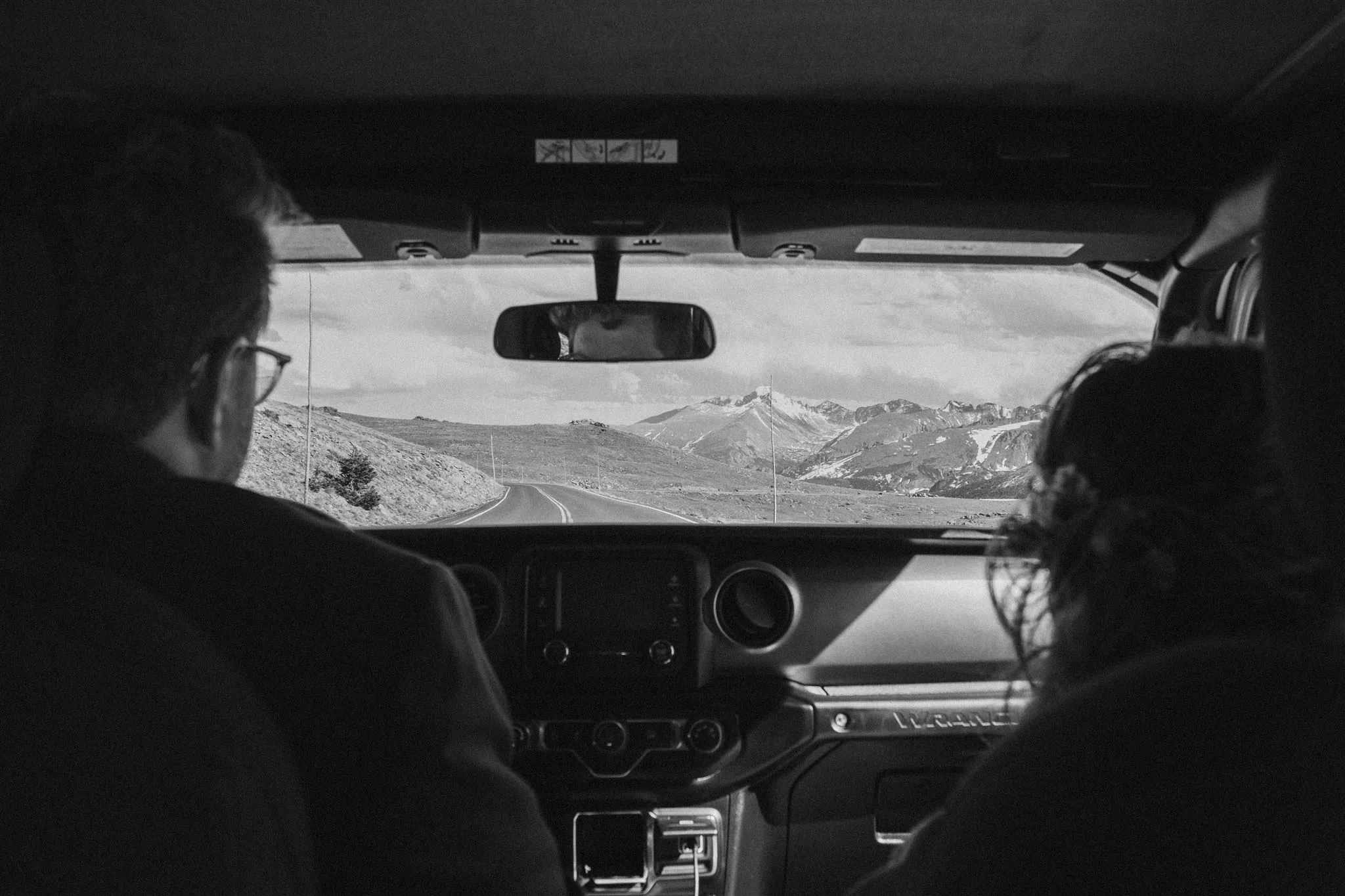 Backseat view of driving up Trail Ridge Road